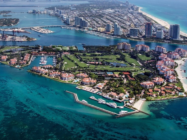 Witness the beauty of Miami Beach’s golden shores and iconic skyscrapers from a bird’s-eye perspective