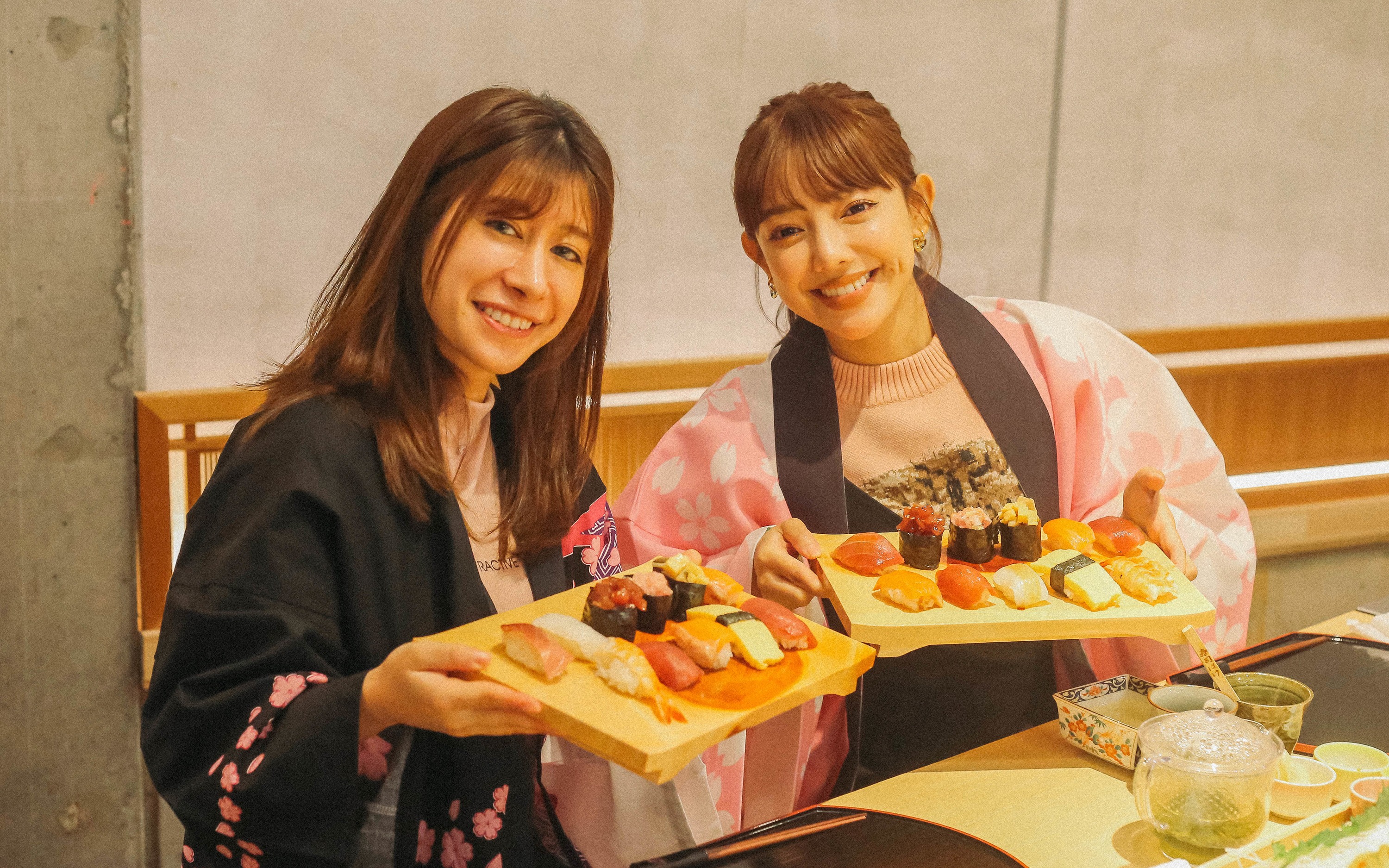 Savor a sushi-making experience in a kimono on Kokusai Street, Naha.