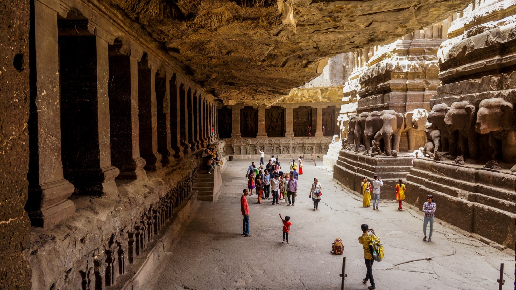 Tourist are watching Ellora Caves.