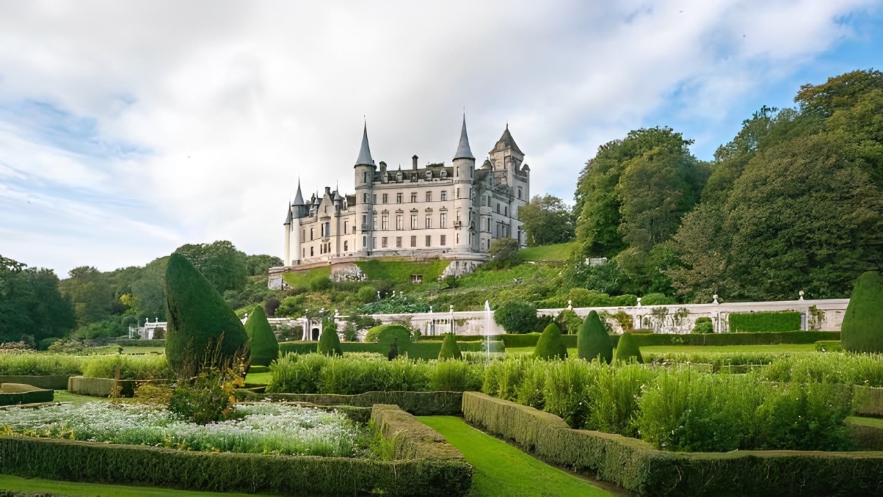 Dunrobin Castle stands majestically with its fairytale spires and lush gardens, a timeless Scottish gem