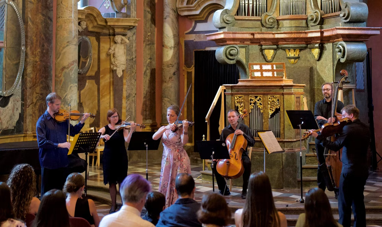 Talented musicians perform classical pieces with passion, surrounded by historic charm and elegance