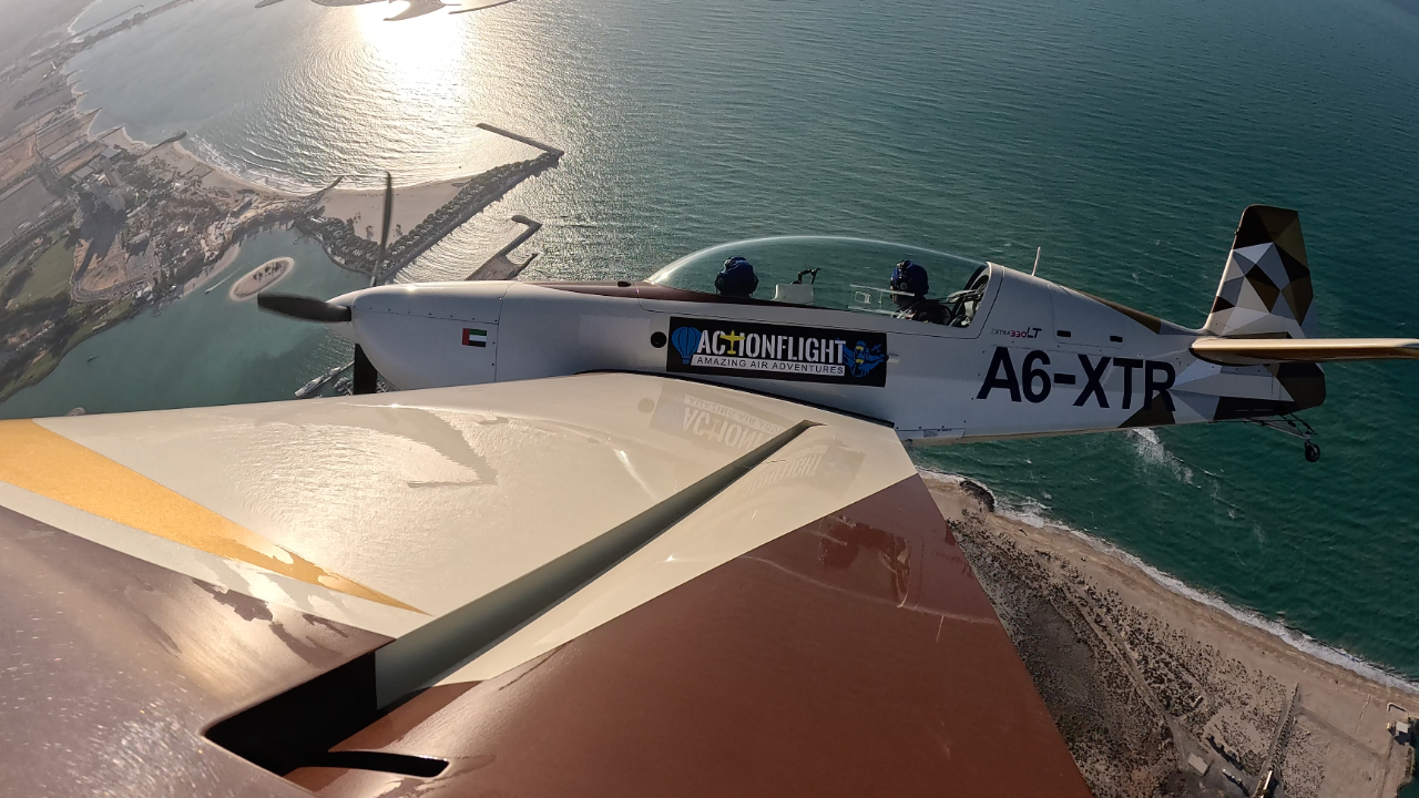 Experience the thrill of high-speed aerobatics in the world-class EXTRA 330 aircraft