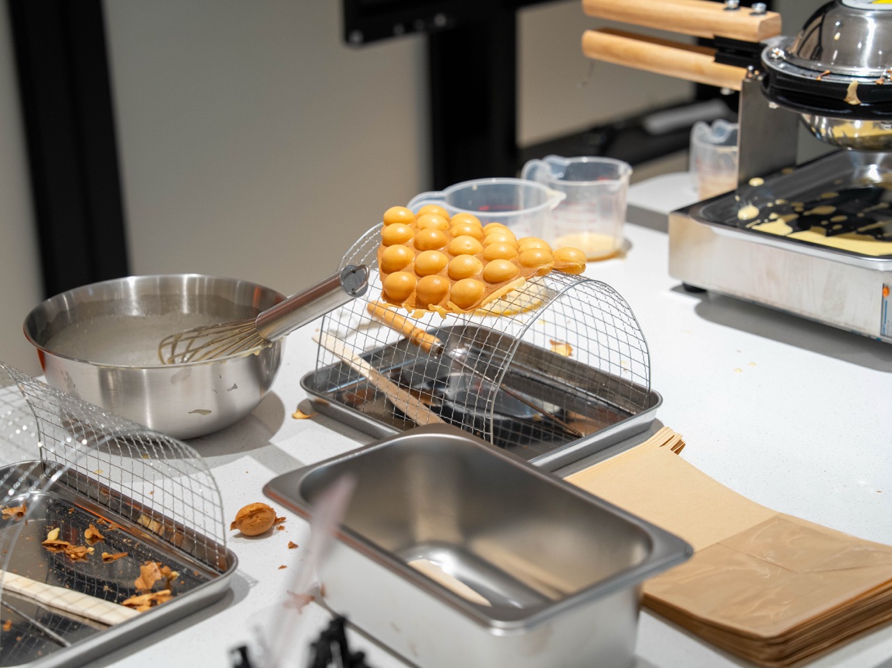 Freshly baked Hong Kong-style egg waffles, golden and crispy on the outside, soft and fluffy on the inside.