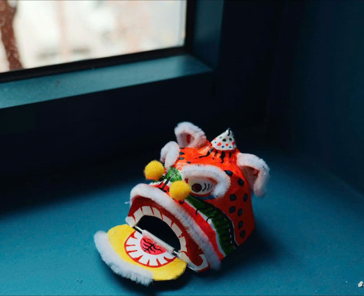 Mini lion head decoration workshop and story of lion dance