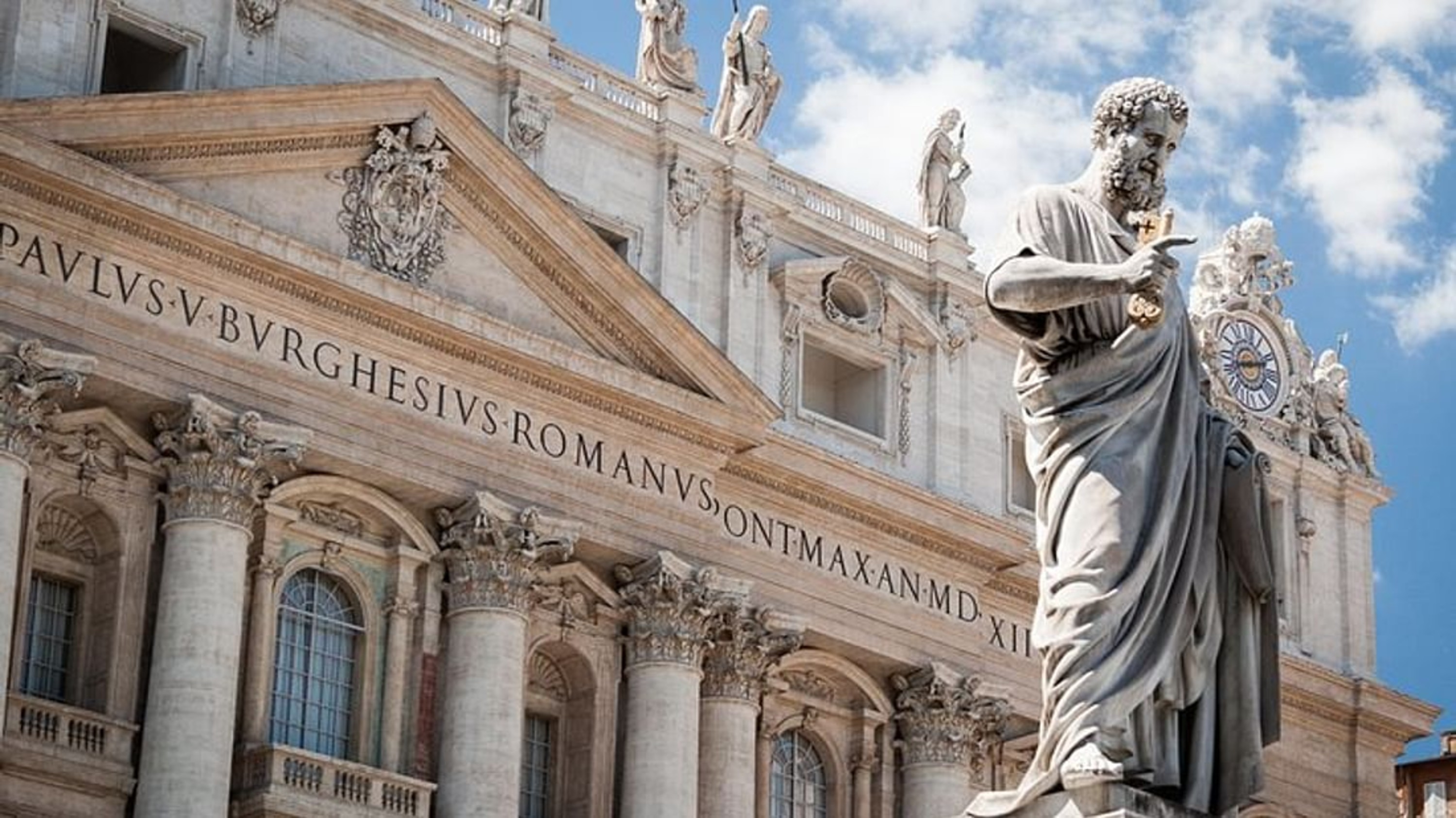 Expansive plaza encircled by colonnades, hosting pilgrims beneath the Vatican's symbolic obelisk