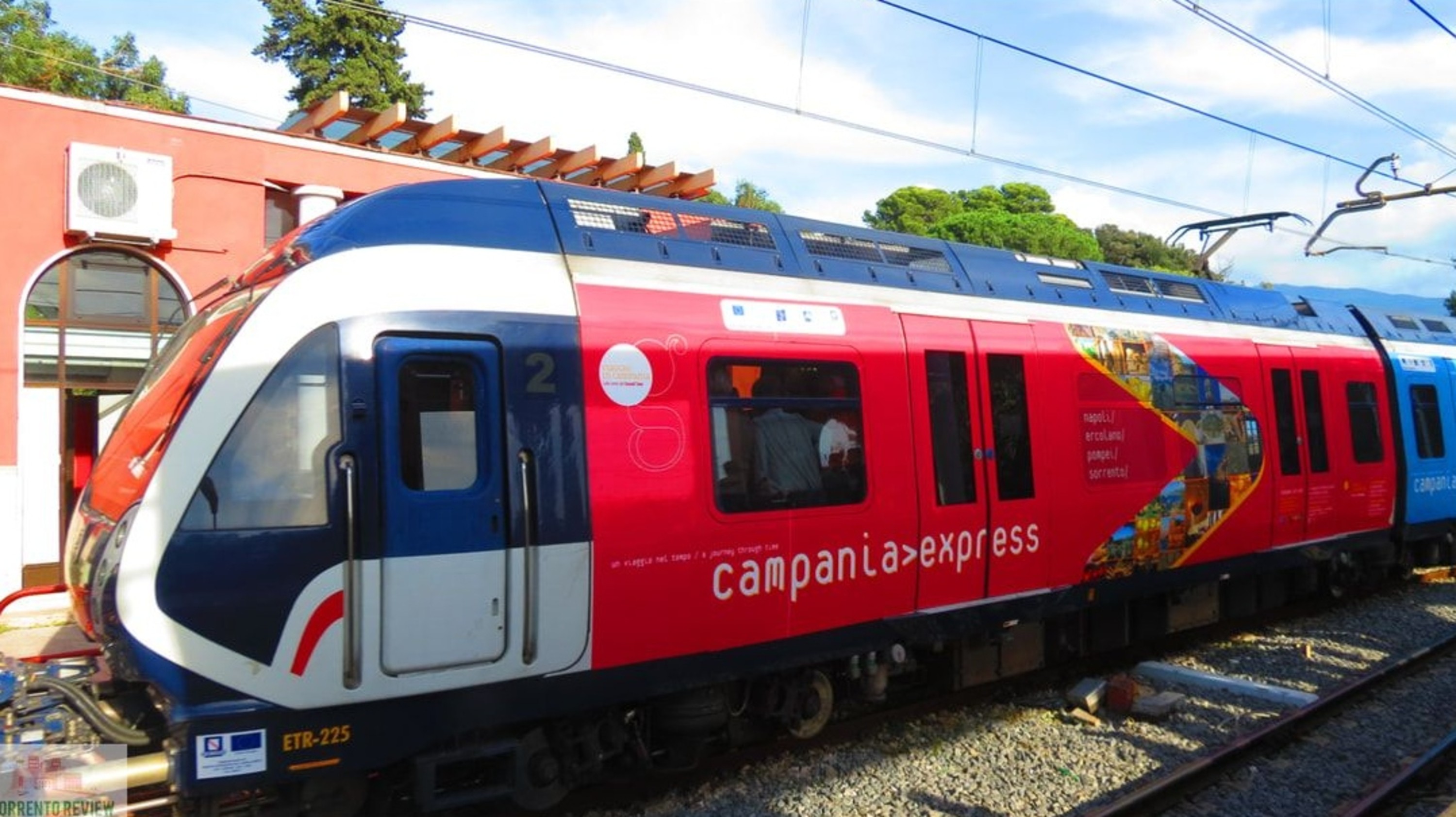 Sleek modern train gliding through the countryside, offering scenic views and unmatched travel comfort