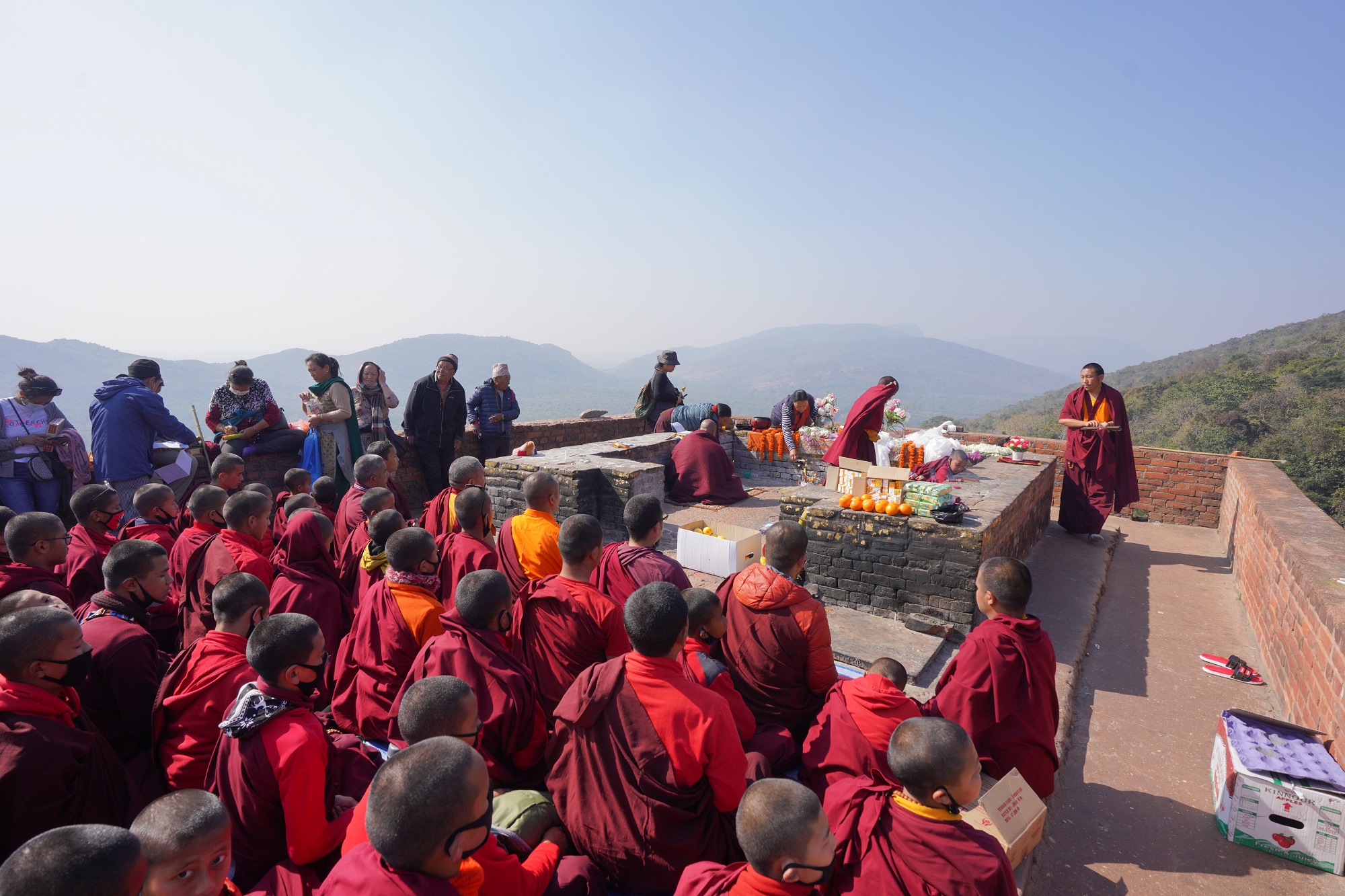 RAJGIR, View of Buddhist Monk Praying at the Top of Gridhrakuta Hill or Vulture Peak.