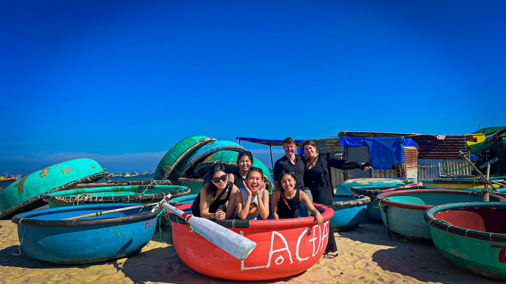 Take photo with traditional boat