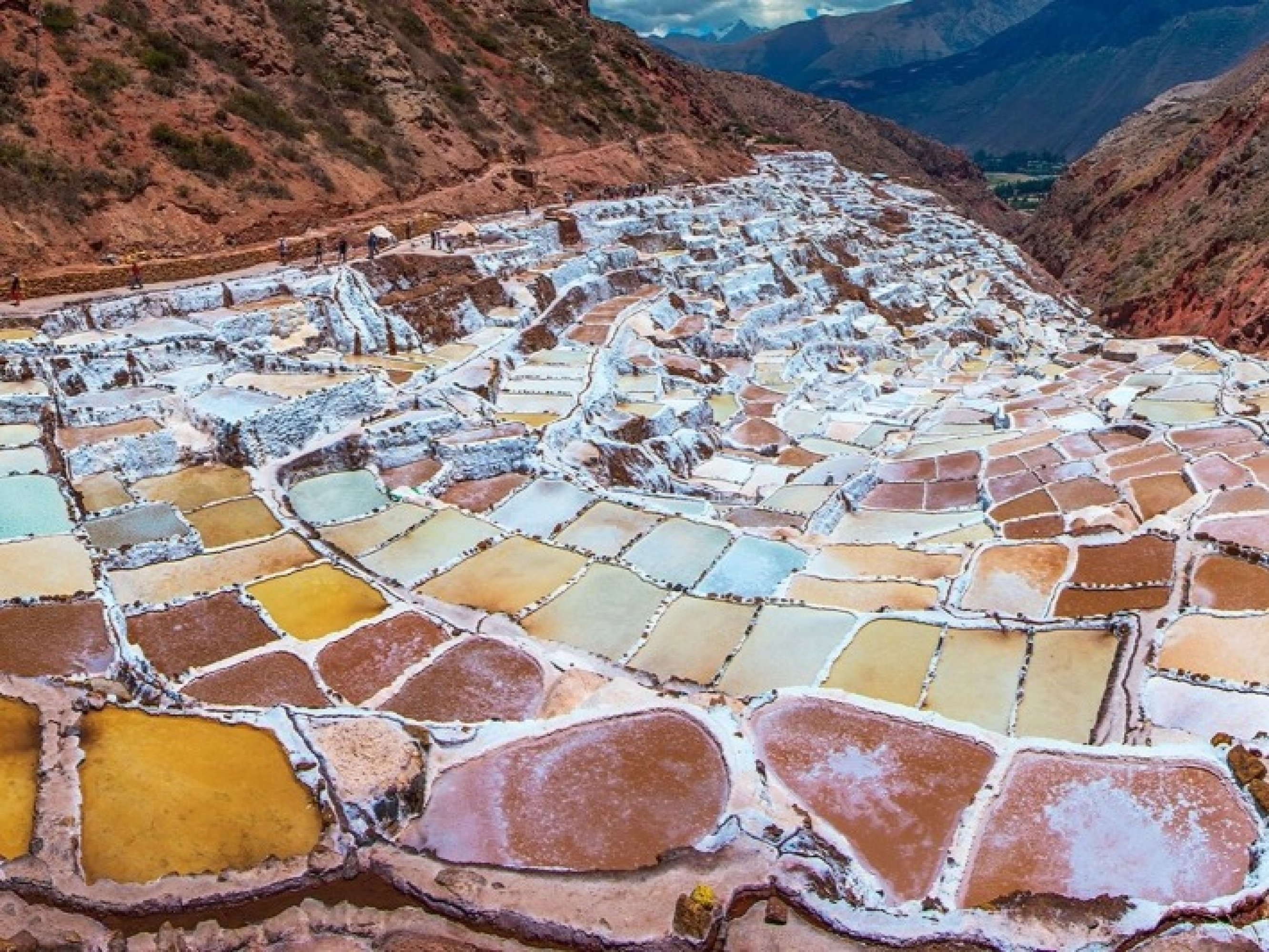 Maras salt mines sparkle—thousands of salt pans glisten under Andean sunshine