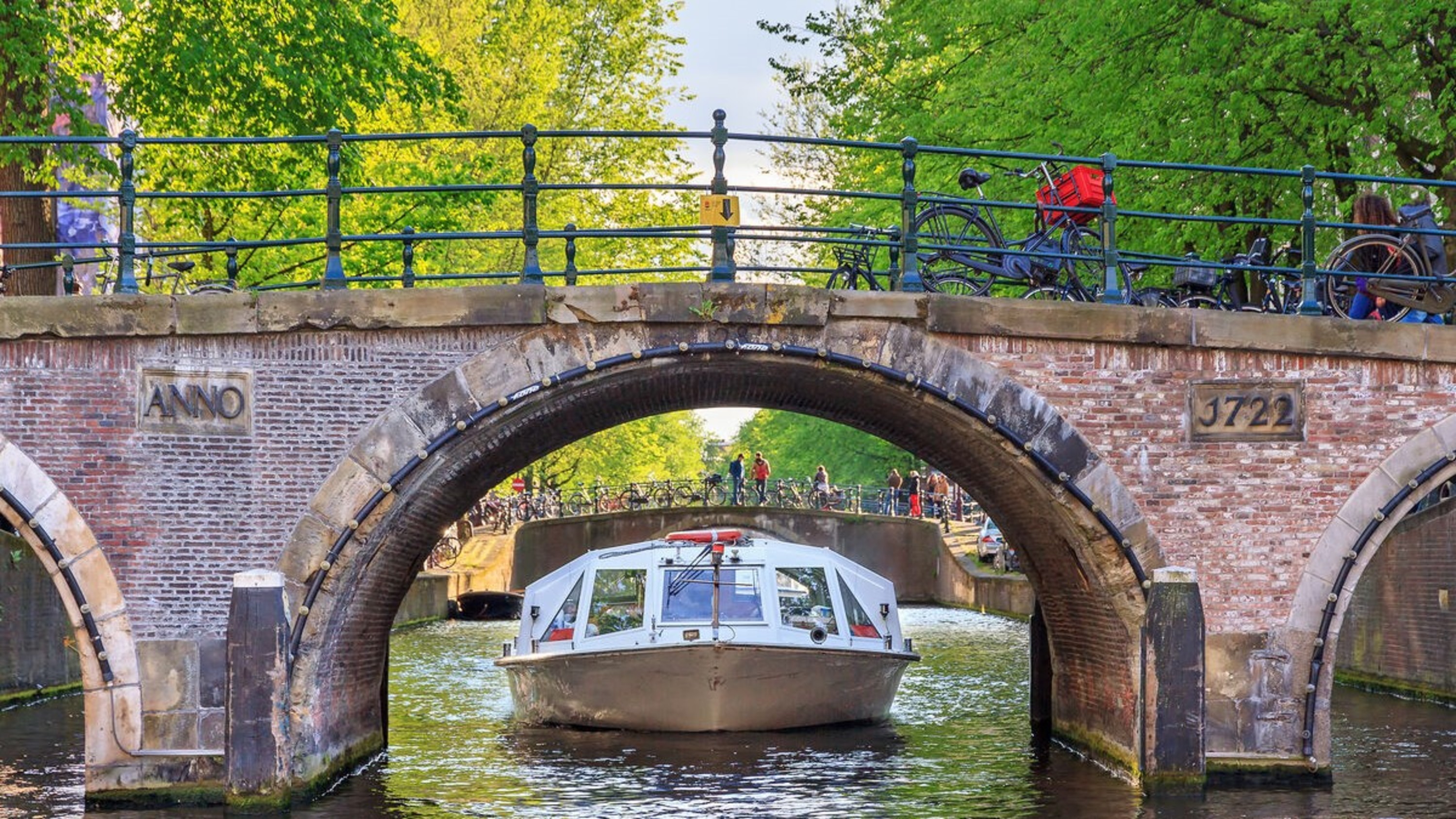 Sail through Amsterdam’s picturesque canals and experience the city’s beauty from the water