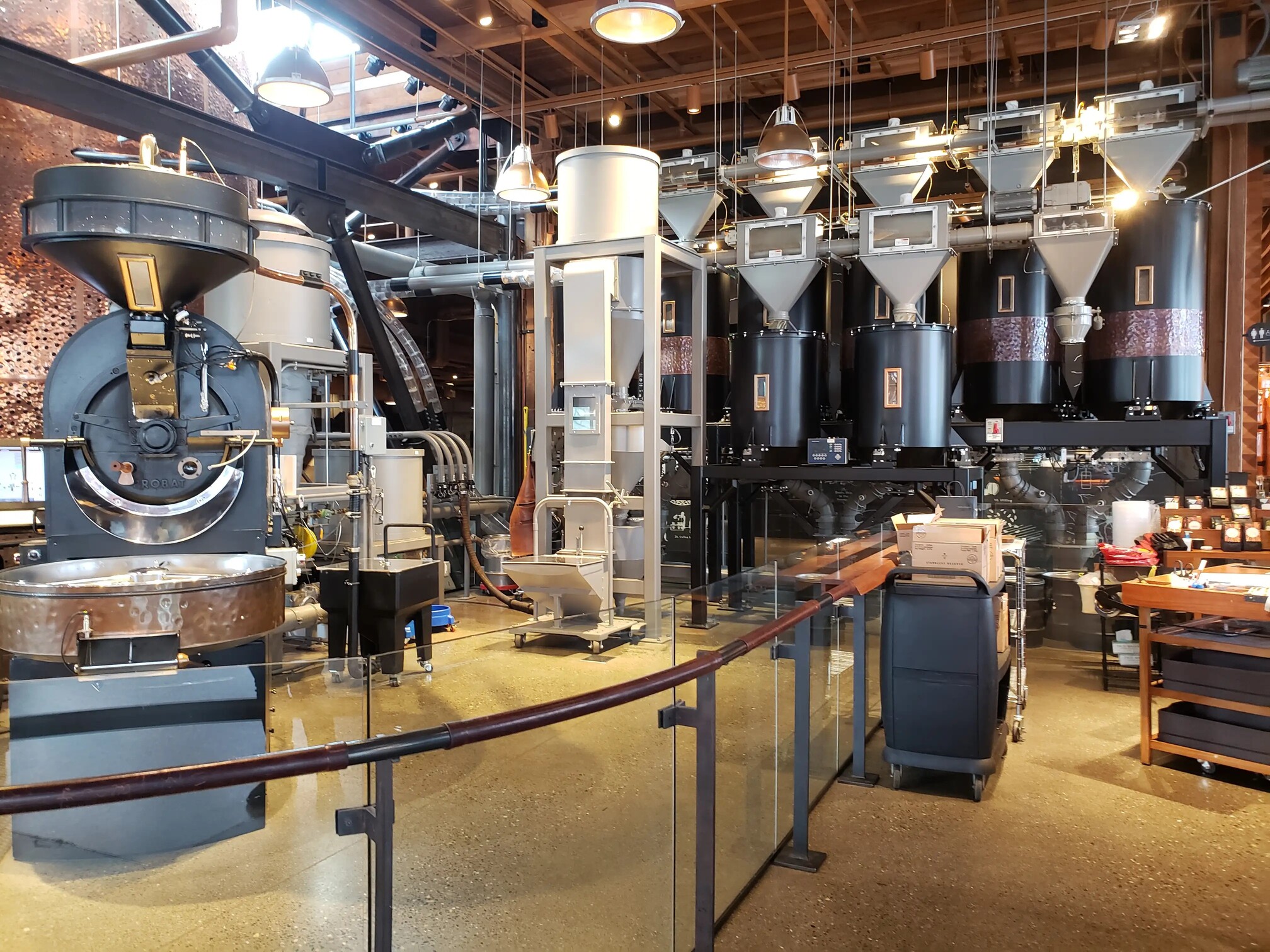 Observe Starbucks Reserve Roastery machines in action, crafting specialty brews with high-tech precision