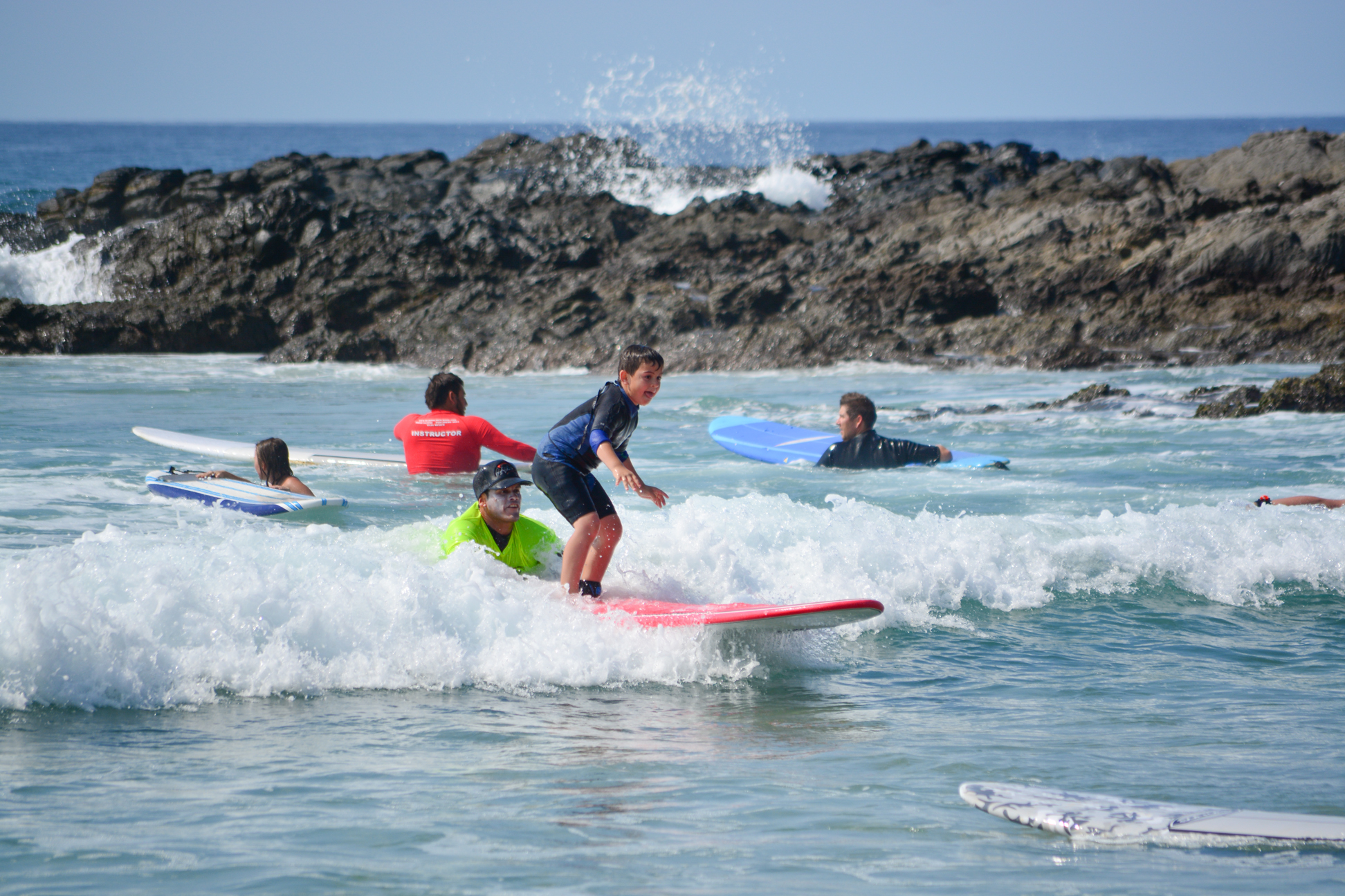 Surf with a soft-top board designed for safety and easy handling