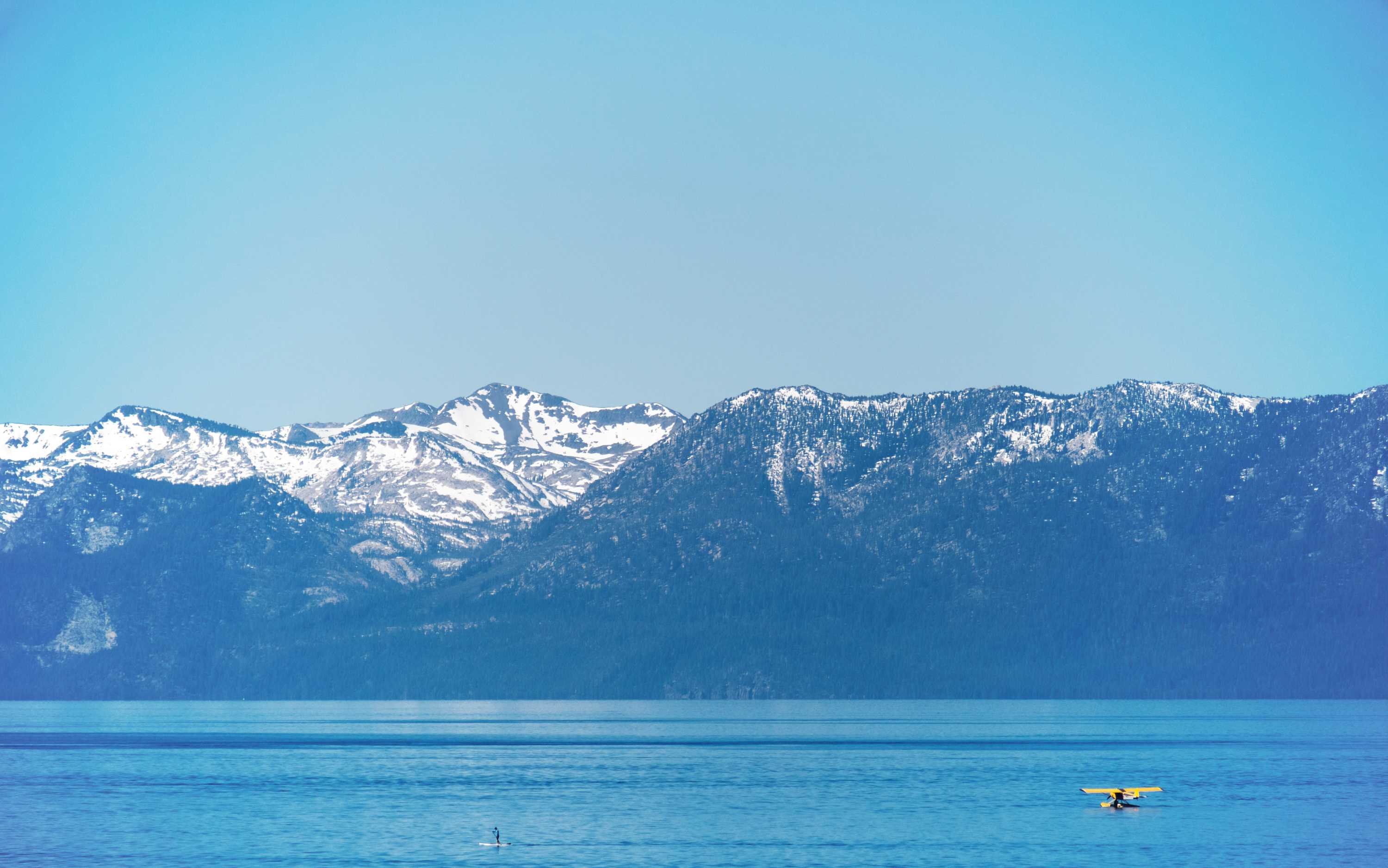 Peaceful alpine views across the vast and deep blue waters of Tahoe Peaceful alpine views across the vast and deep blue waters of Tahoe