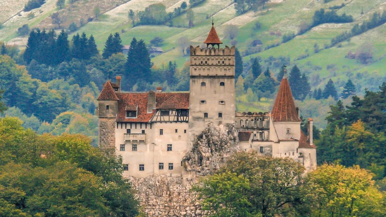 The medieval Bran Castle, often linked to the Dracula legend, stands majestic