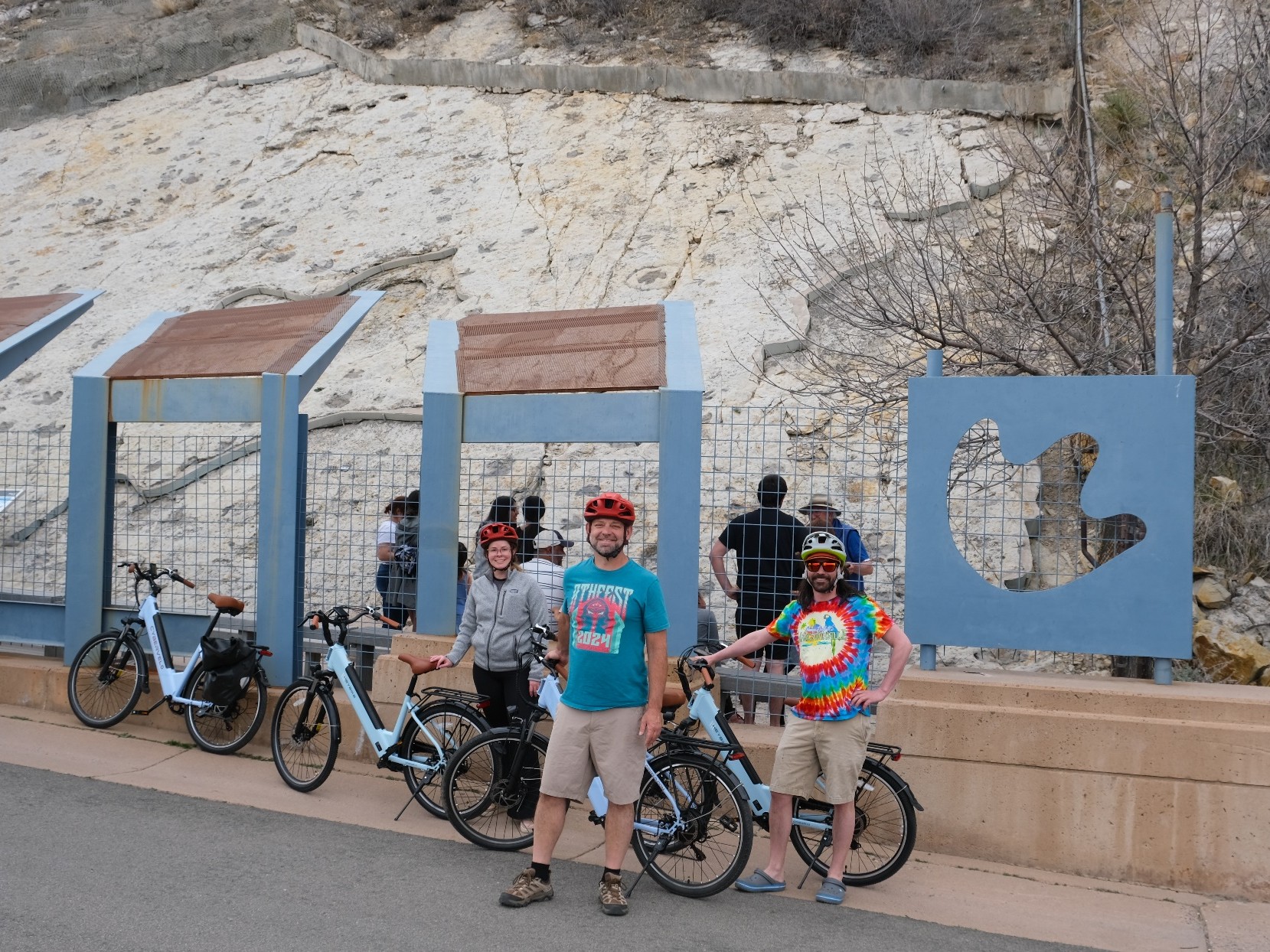 Pose for picture at Dinosaur Ridge, surrounded by ancient fossils and mountain scenery