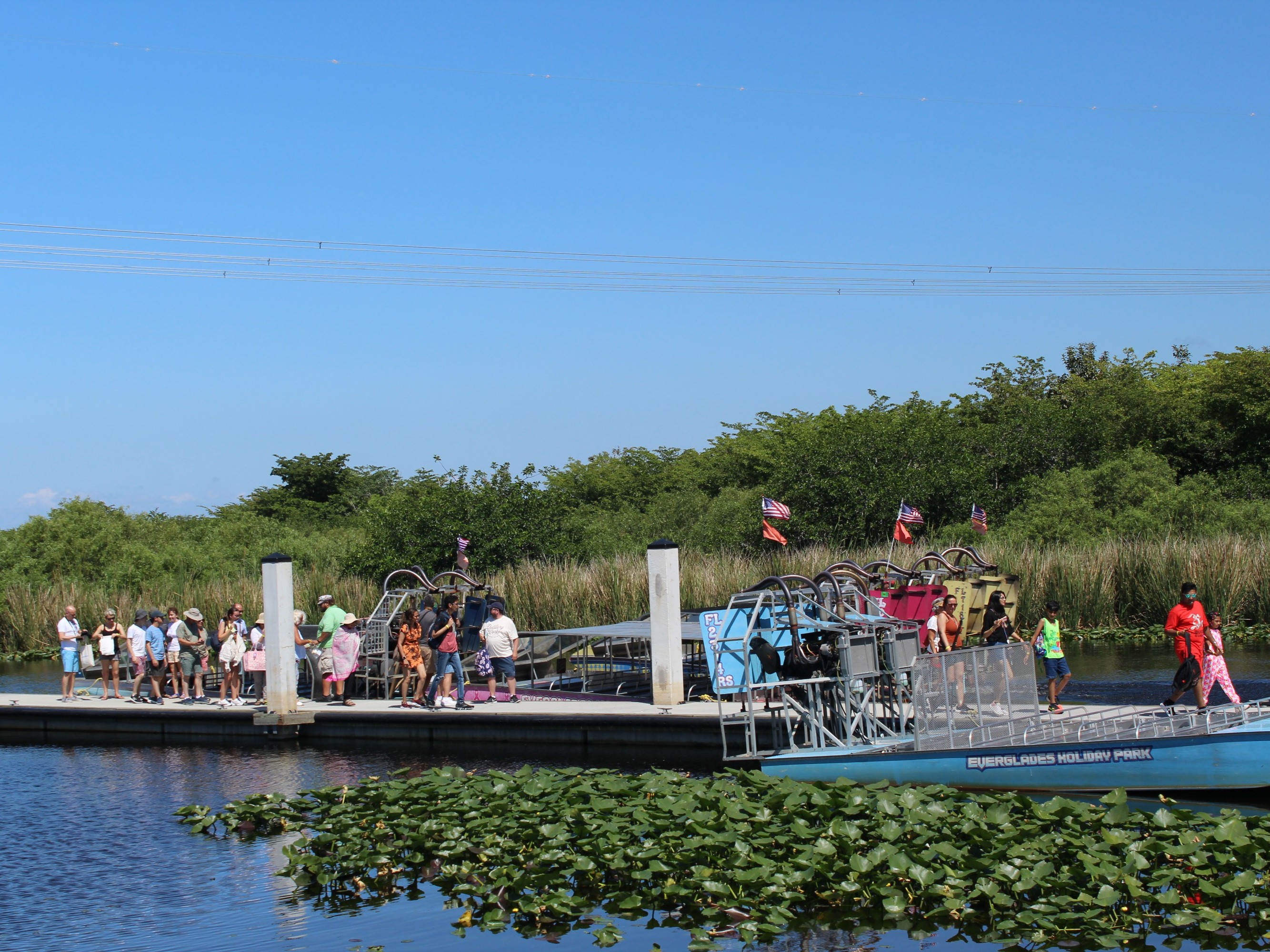 Join excited participants aboard the boat, ready to explore the wild Everglades