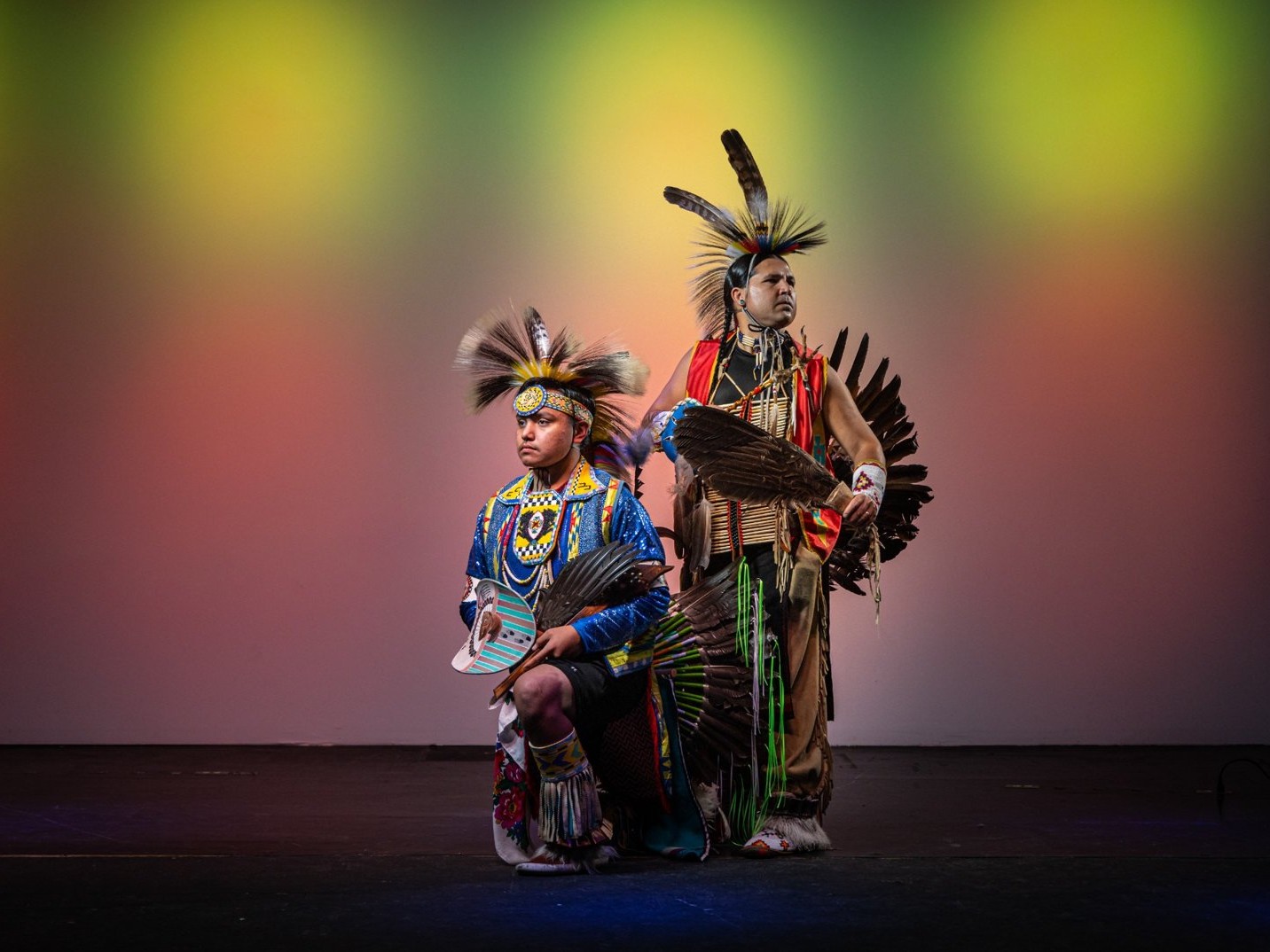 Present Northern Traditional Dance, showcasing colorful regalia and powerful storytelling through movement