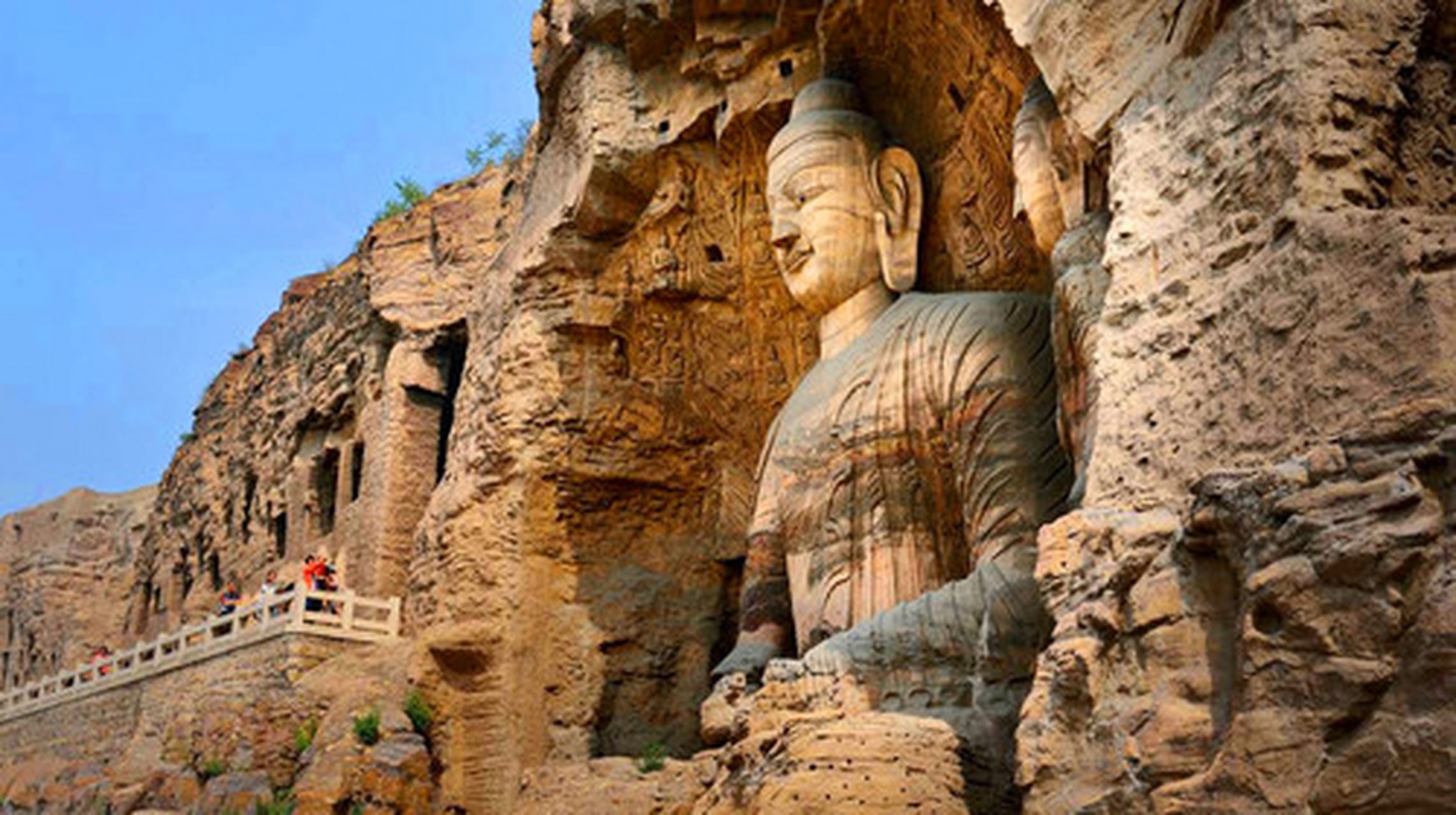 After lunch in the local restaurant, explore the Yungang Grottoes.  Follow your tour guide to explore the grottoes and niches, get to know its history and culture.