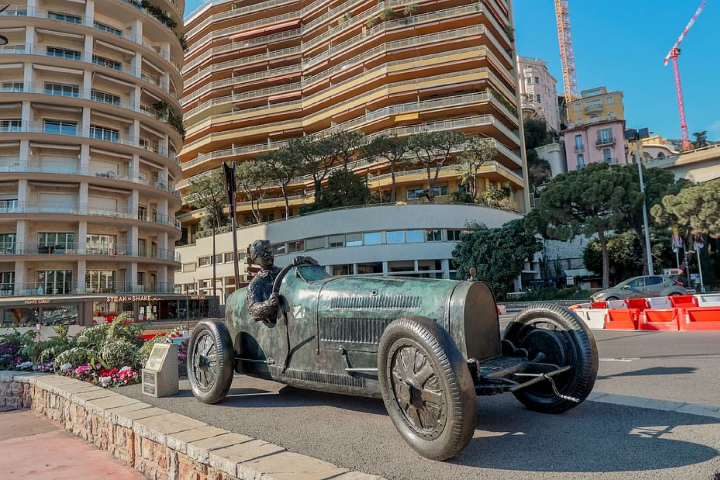 Capturing a moment with the William Grover statue in Monaco