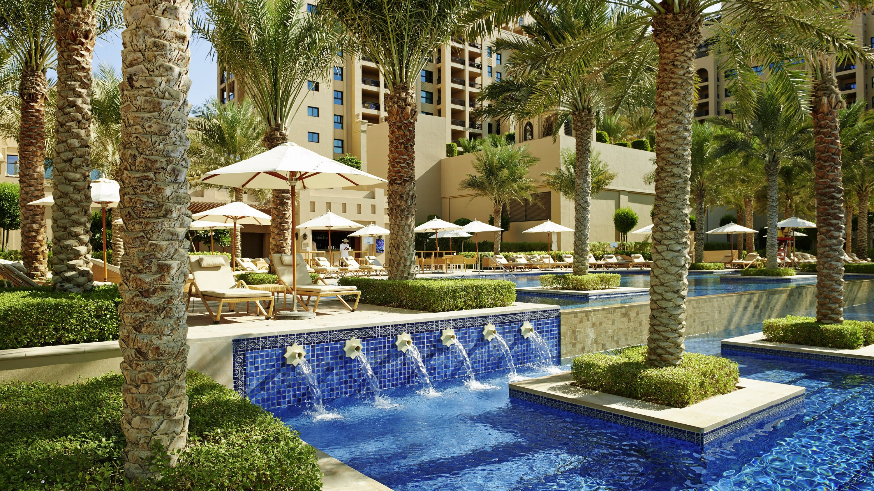 Lounging poolside, basking in the warm sun and enjoying the tranquil, resort-style ambiance