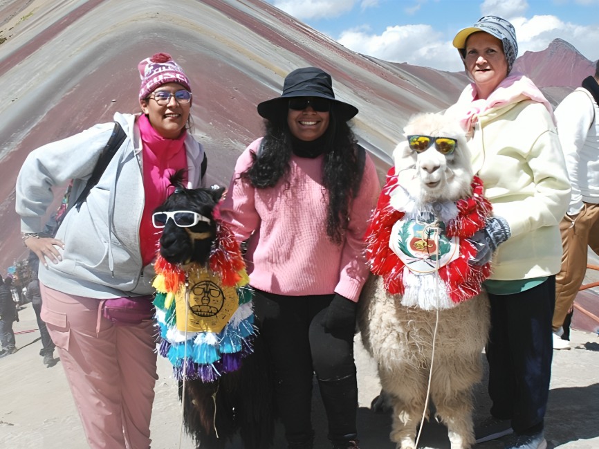 Vibrant view of Rainbow Mountain showcasing its stunning natural mineral-striped ridges and colors