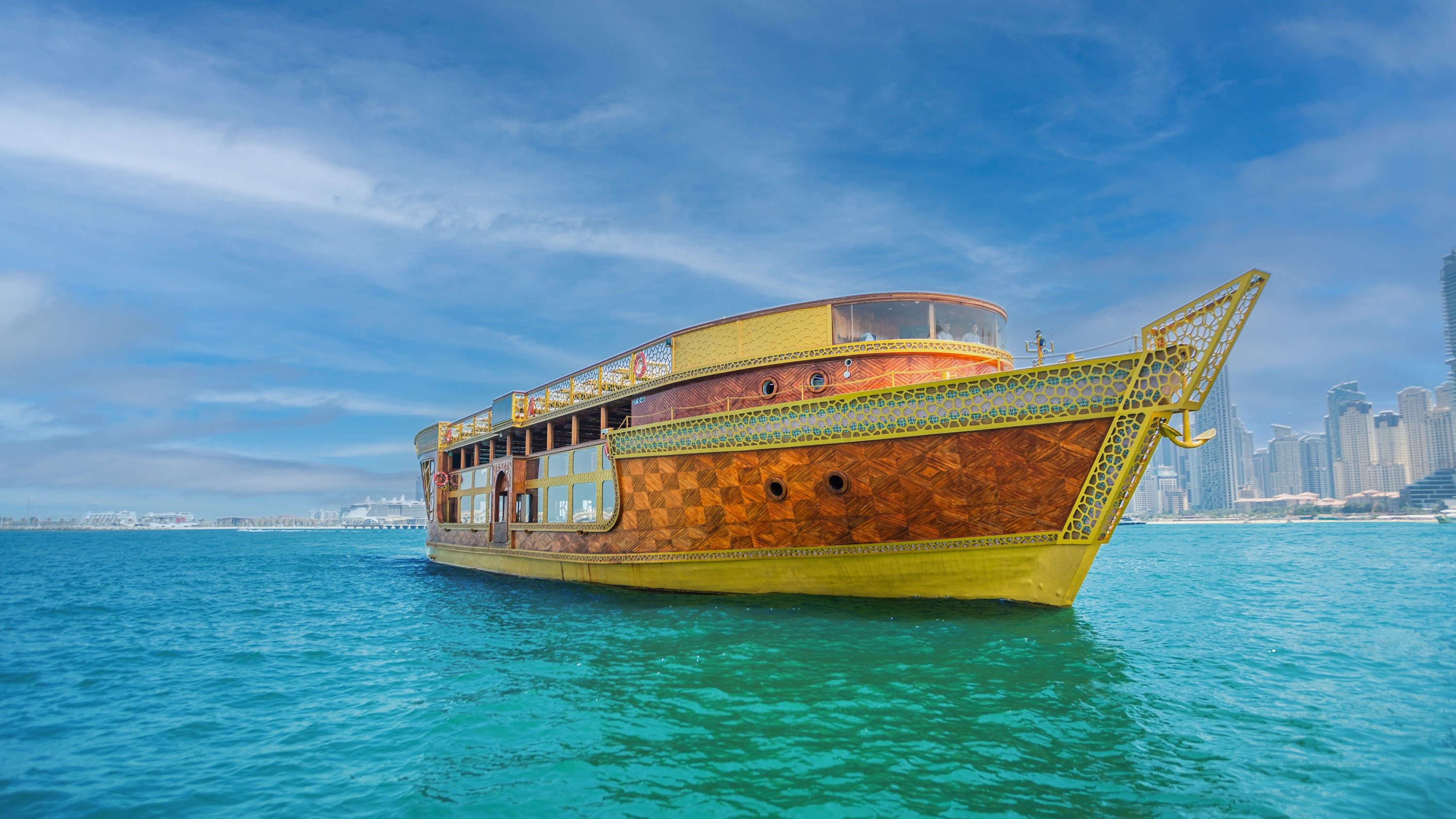 Step aboard and watch the skyline come alive in golden hues