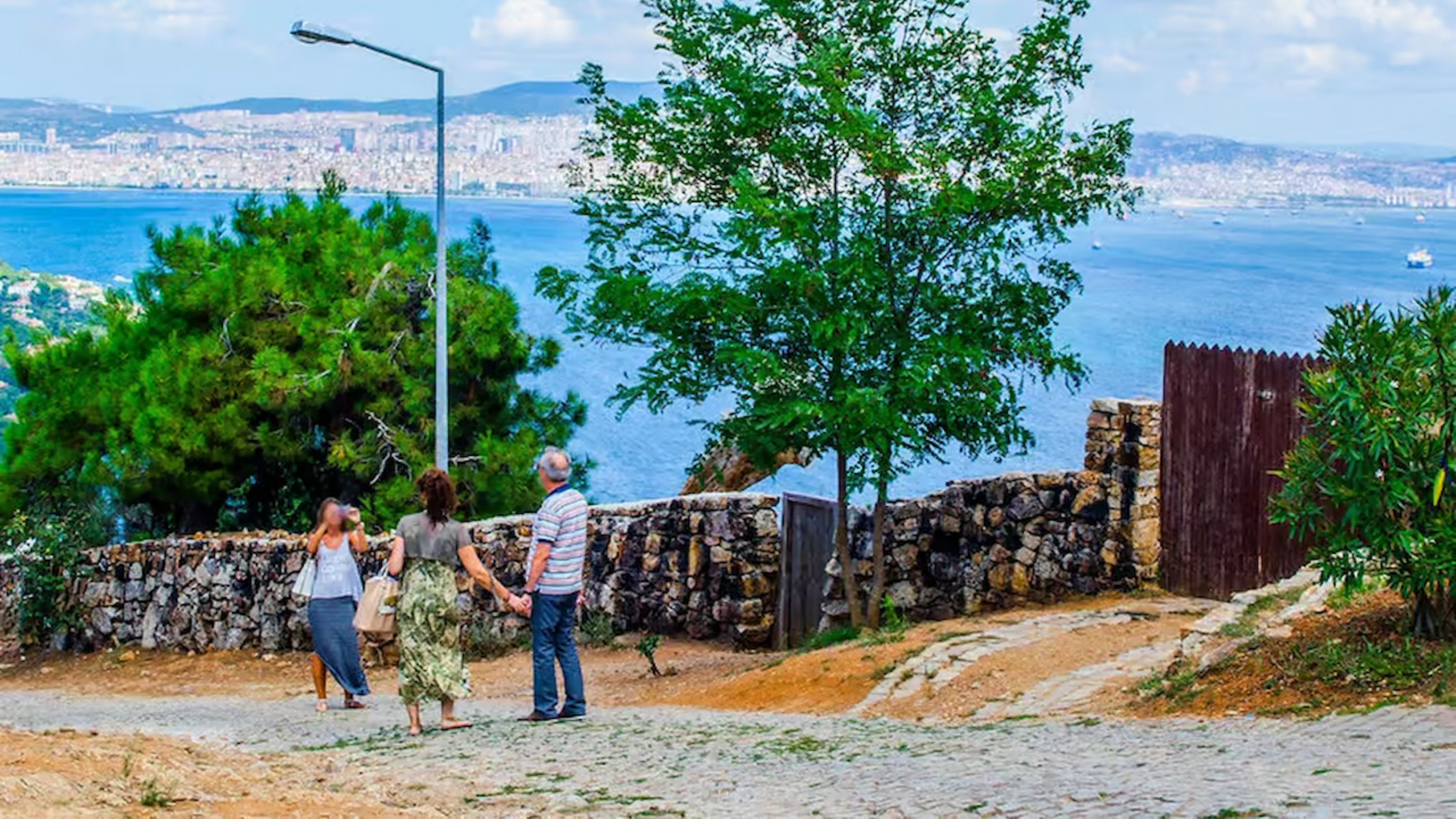 Relax with lunch by the harbor, surrounded by island charm and sea breeze