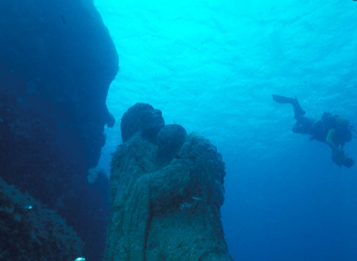 Explore the captivating underwater world of Villasimius and pay homage to the submerged statue of 'Madonna del Marinaio' as part of our Open Water Course experience