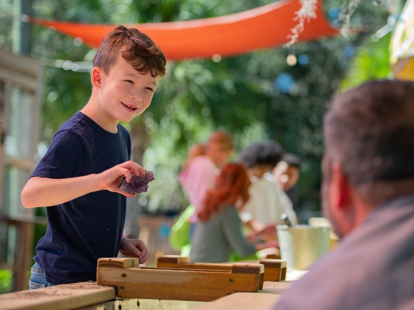 Uncover hidden gems as the boy explores fossil and gem mining activities