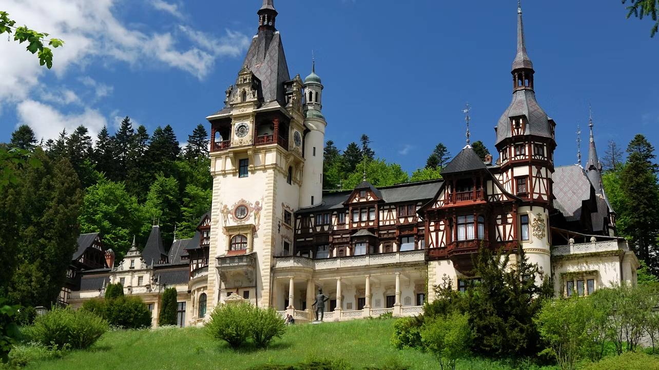 The castle’s windows frame breathtaking views of the Carpathian mountain range
