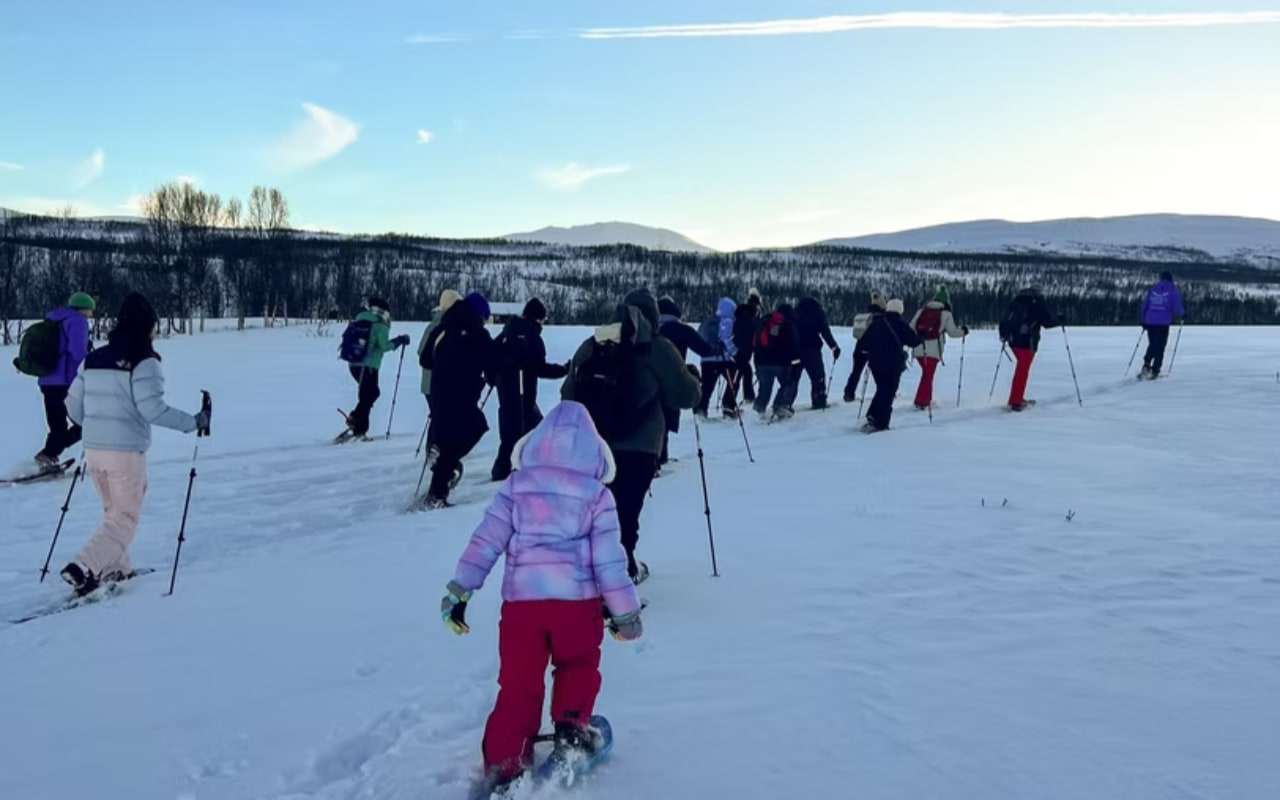 Guided snowshoe tour offering stunning views and invigorating winter air