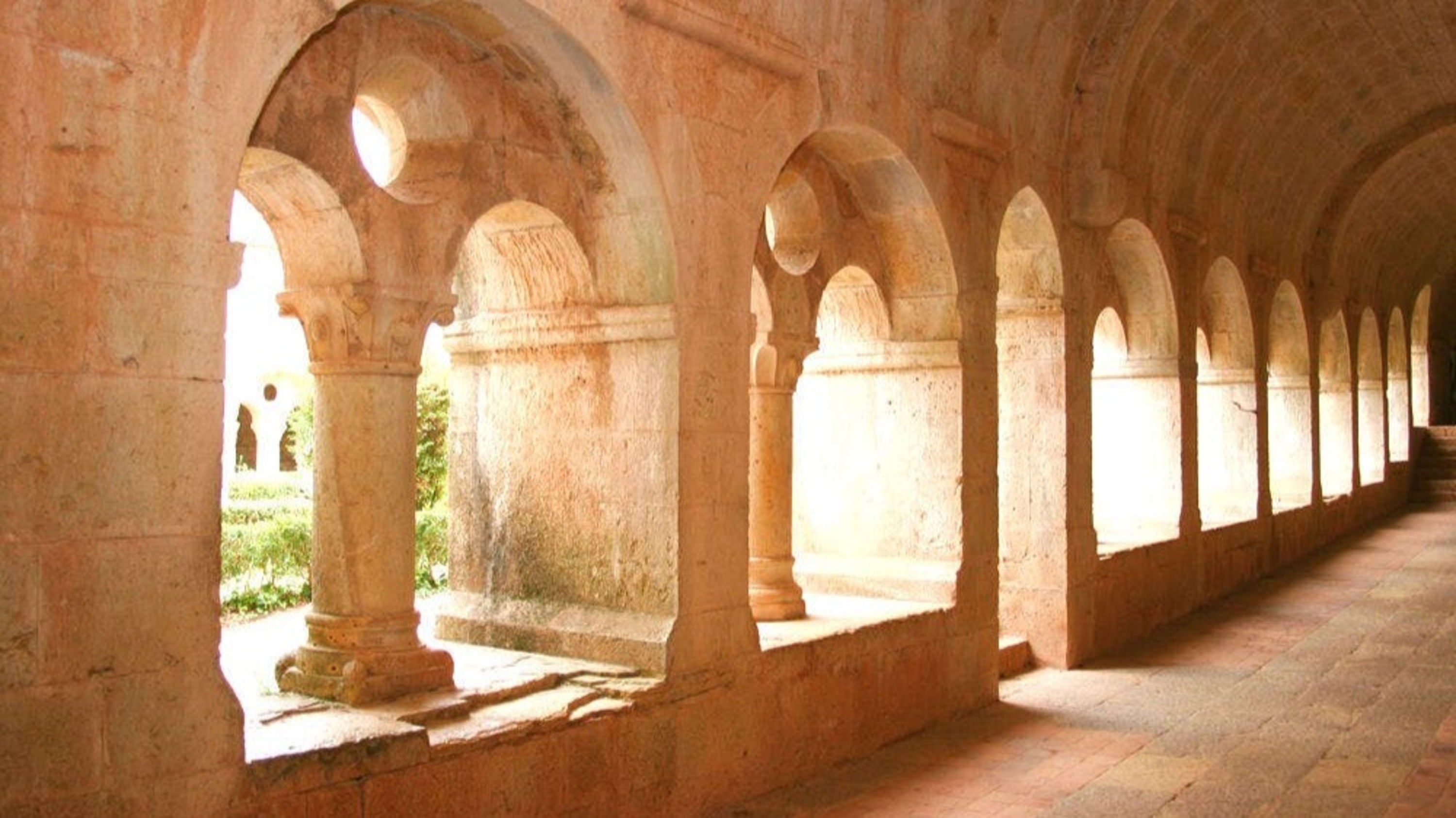 Admire the harmony of Romanesque architecture and natural light
