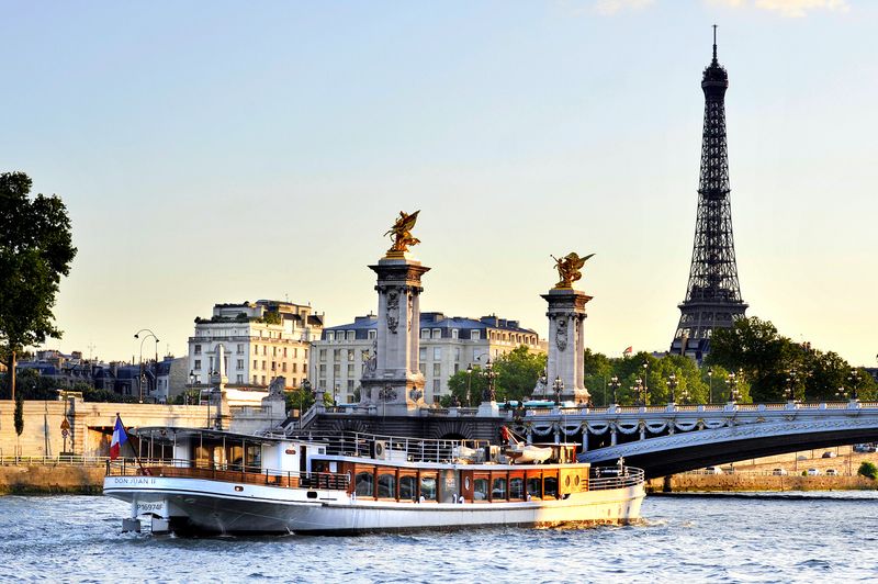 Eiffel Tower Morning Tour and Seine River Cruise Experience