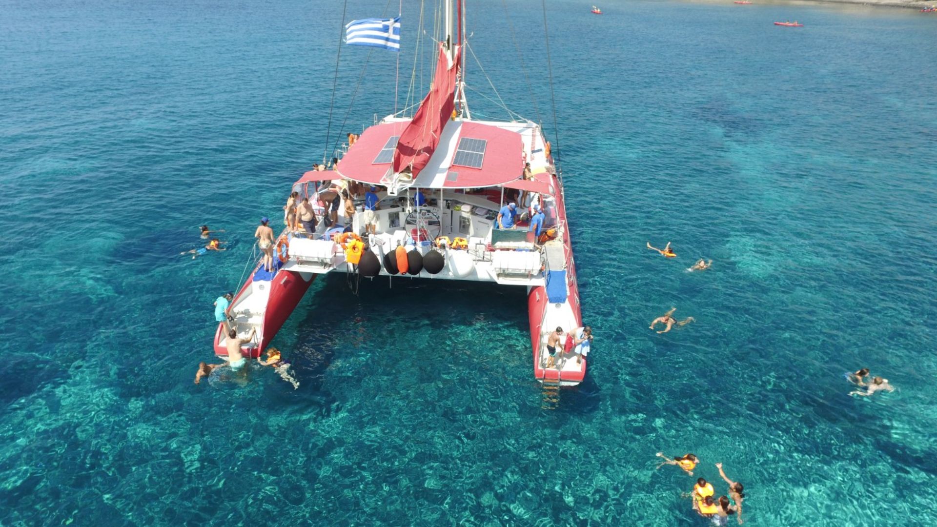 Sail through crystal waters while enjoying a delicious meal and breathtaking island views