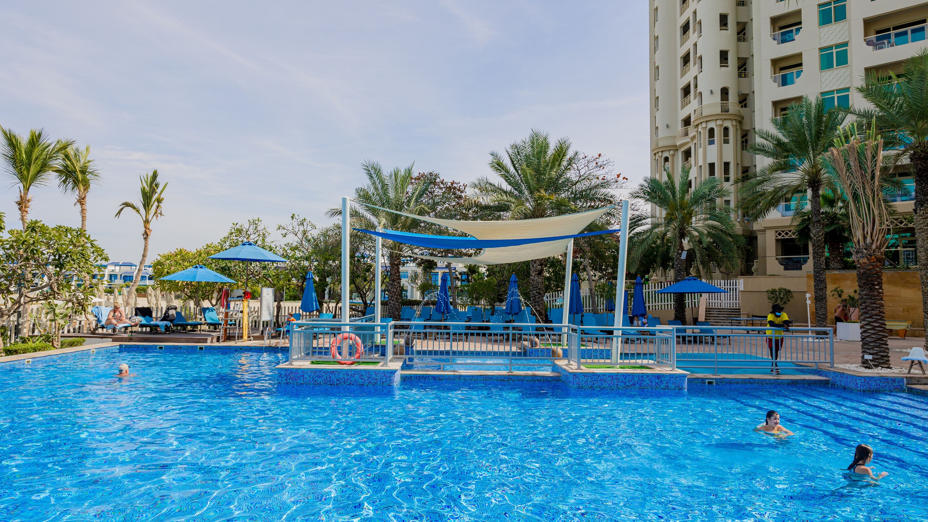 Enjoying a refreshing day by the sparkling sea, soaking in the serene coastal atmosphere