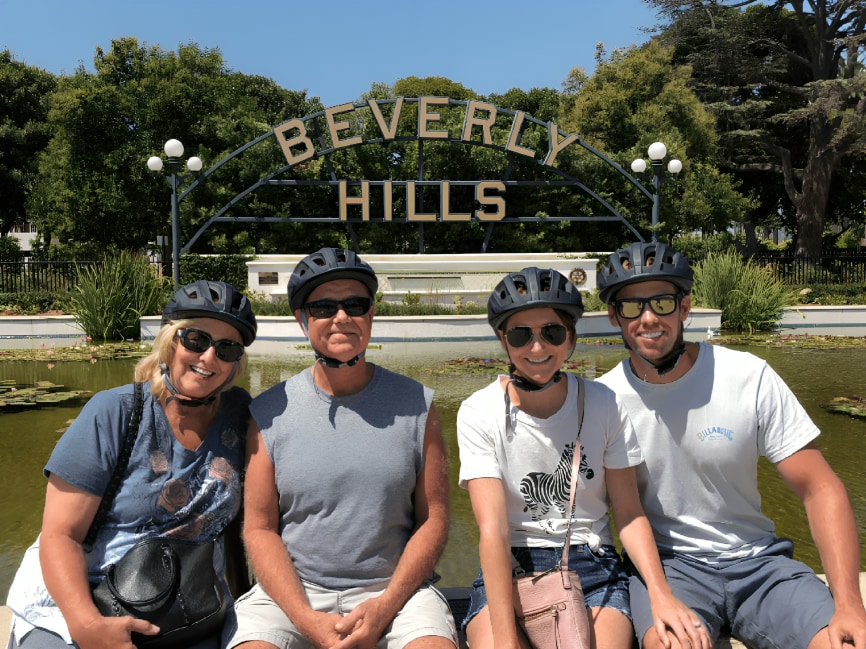 Capturing the perfect moment in front of the legendary Beverly Hills sign