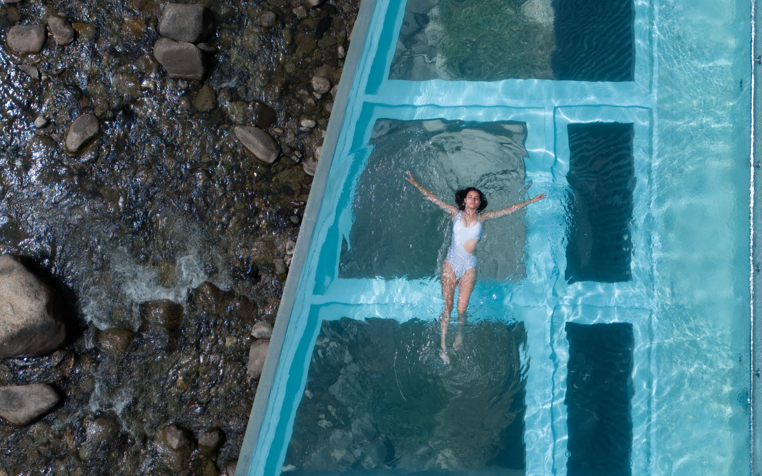 This modern architectural marvel houses a vast, calming aquatic space designed for total wellness and escape