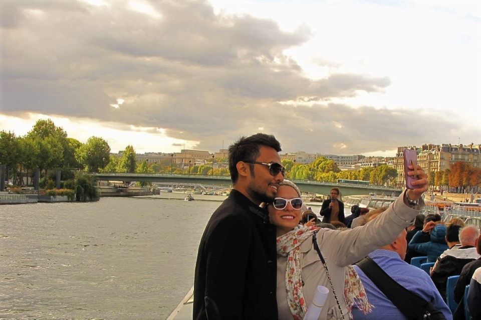 Eiffel Tower Morning Tour and Seine River Cruise Experience