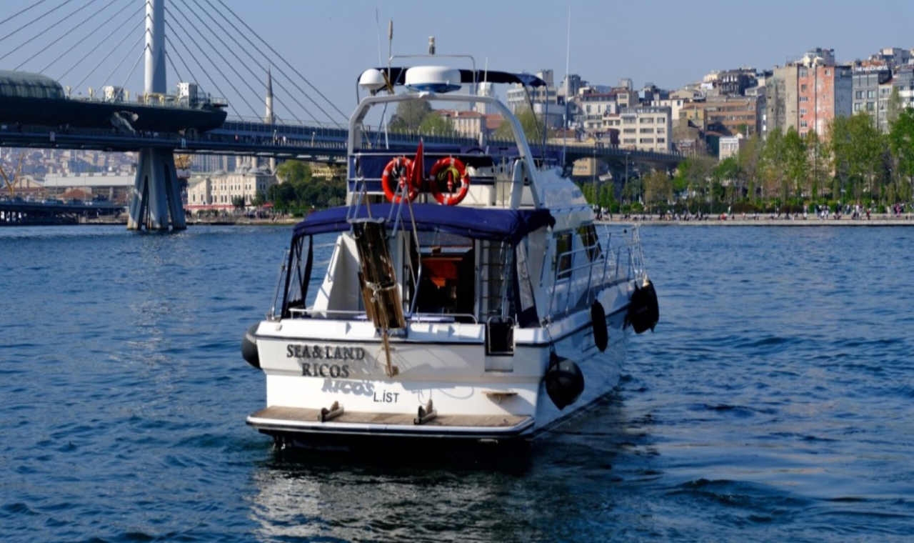 Relax on deck as gentle waves reflect the golden hues of sunset