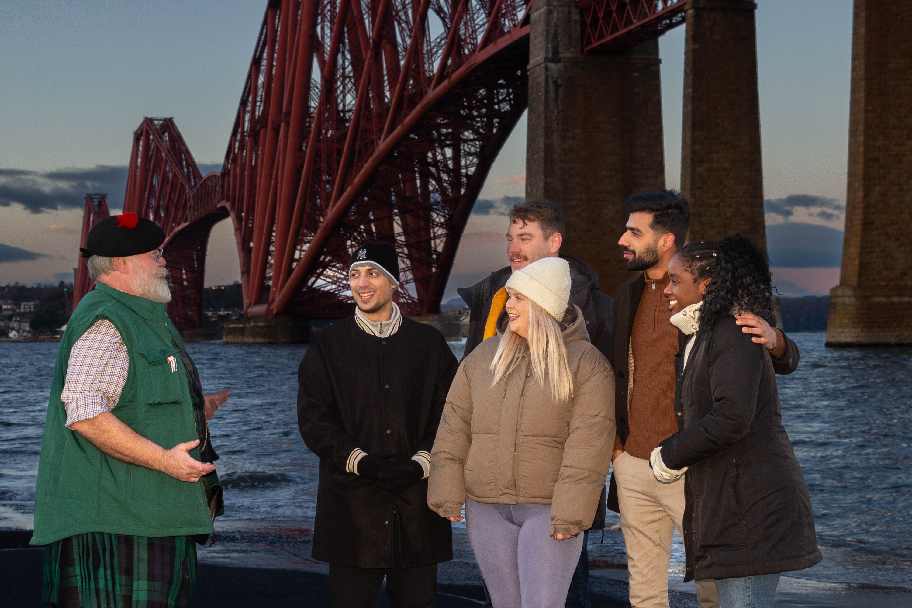 Guide shares fascinating history with tourists, as they admire the views of Queensferry