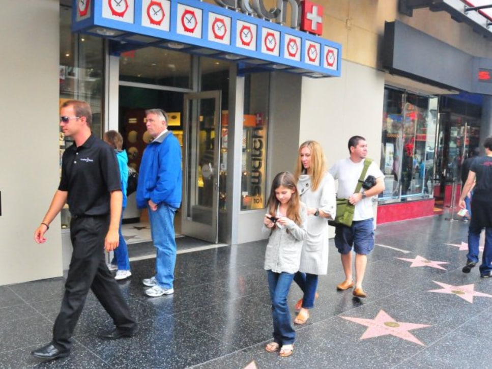 The Walk of Fame dazzles with brass stars honoring entertainment industry legends