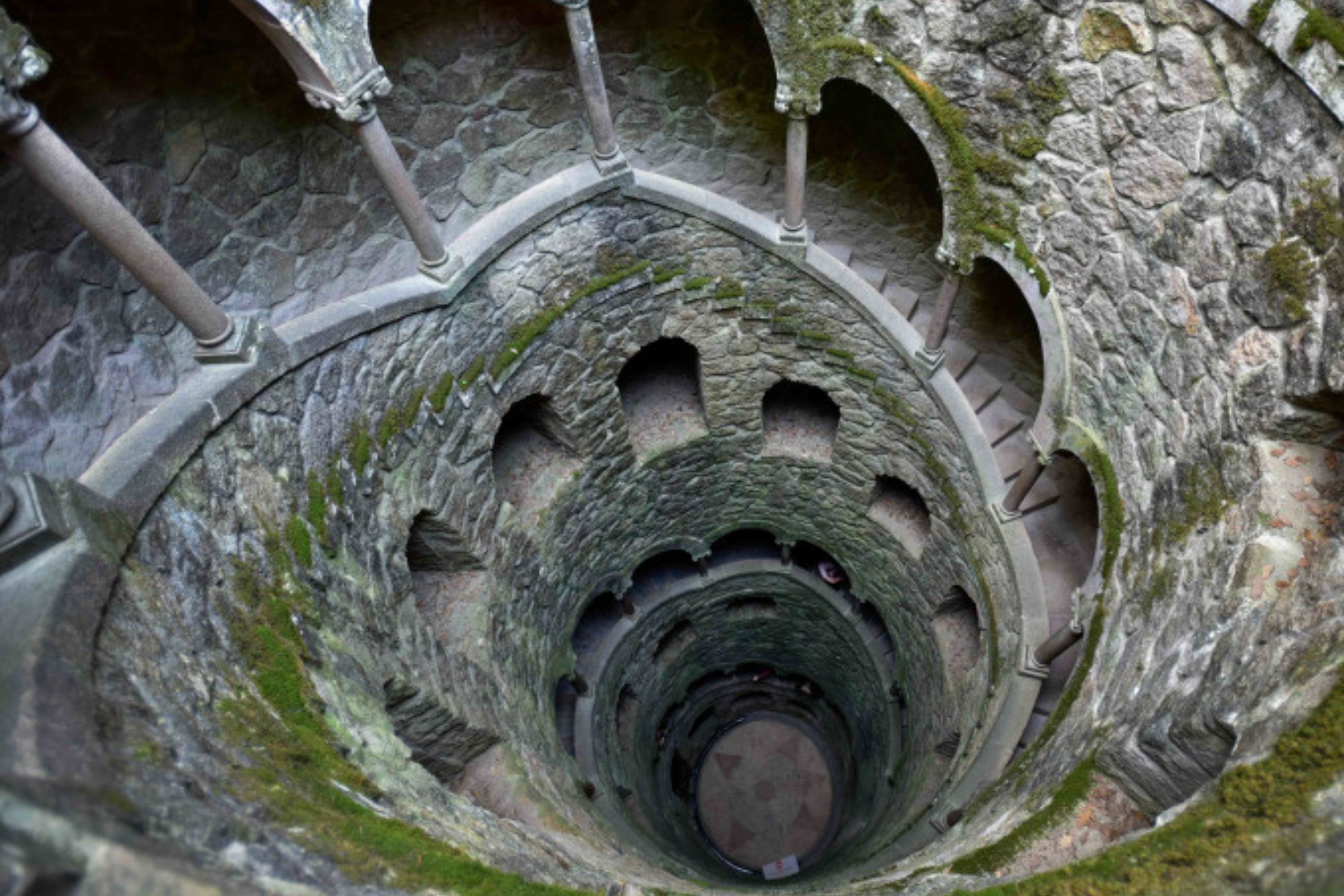 Explore the mystical gardens and tunnels of Quinta da Regaleira, a captivating estate with intriguing symbolism