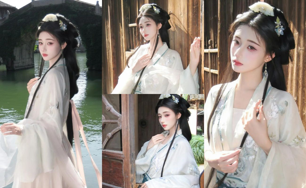 人物穿著淺色系的漢服，款式較為簡約。頭上的髮飾相對簡單，有白色的花朵裝飾，整體風格偏向溫婉、素雅