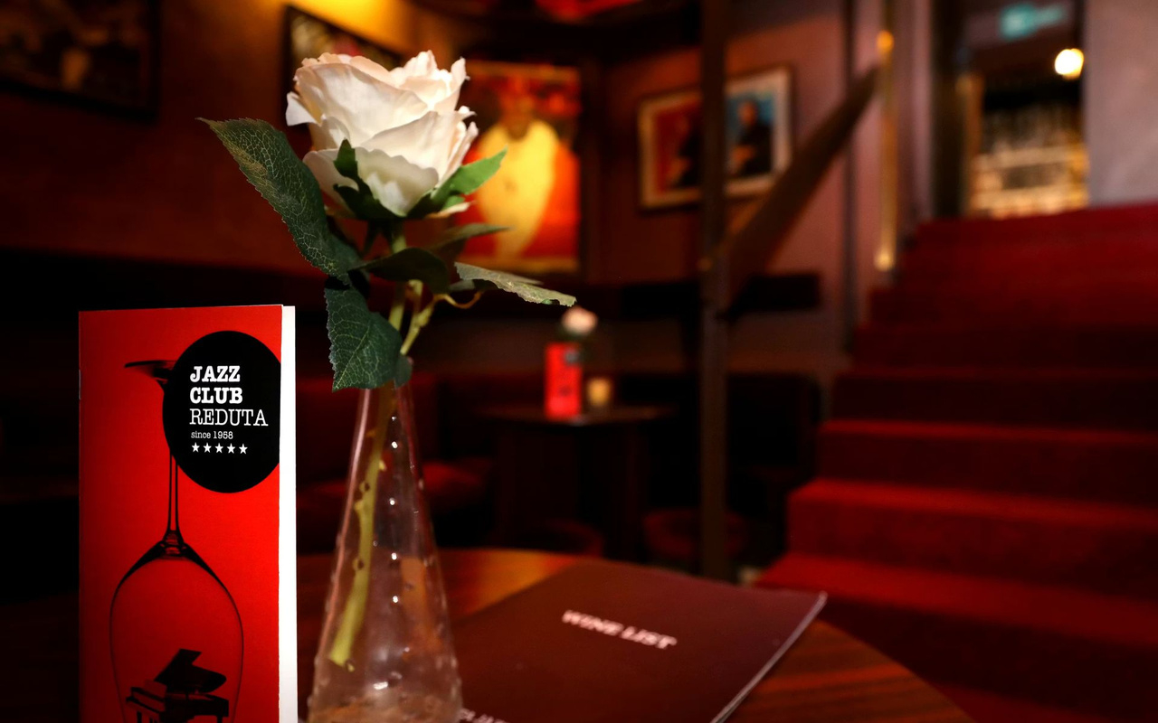 Experience the timeless jazz melodies and intimate ambiance of Reduta tonight