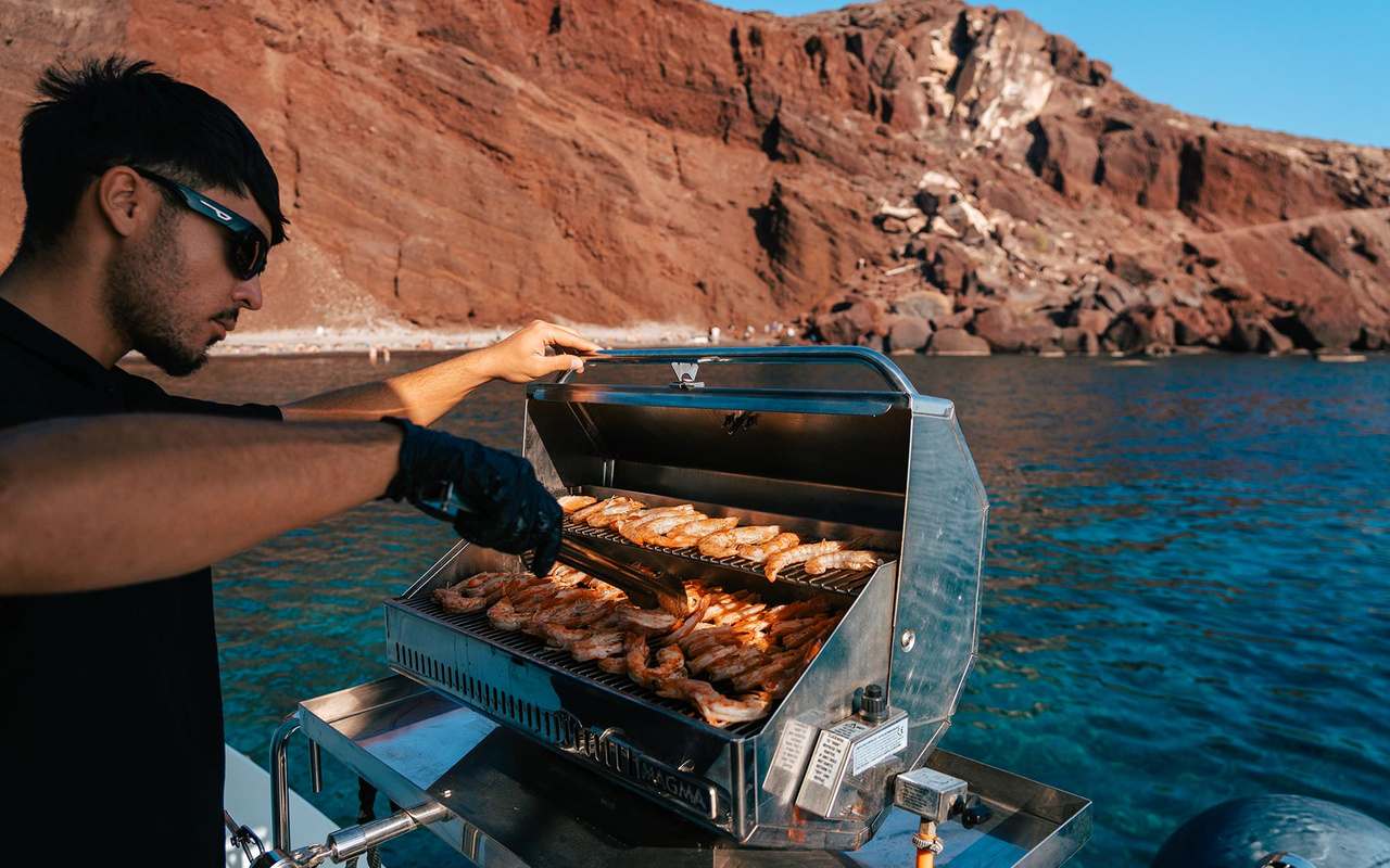 Crystal waters at Red Beach inviting refreshing dips under warm Santorini sunshine