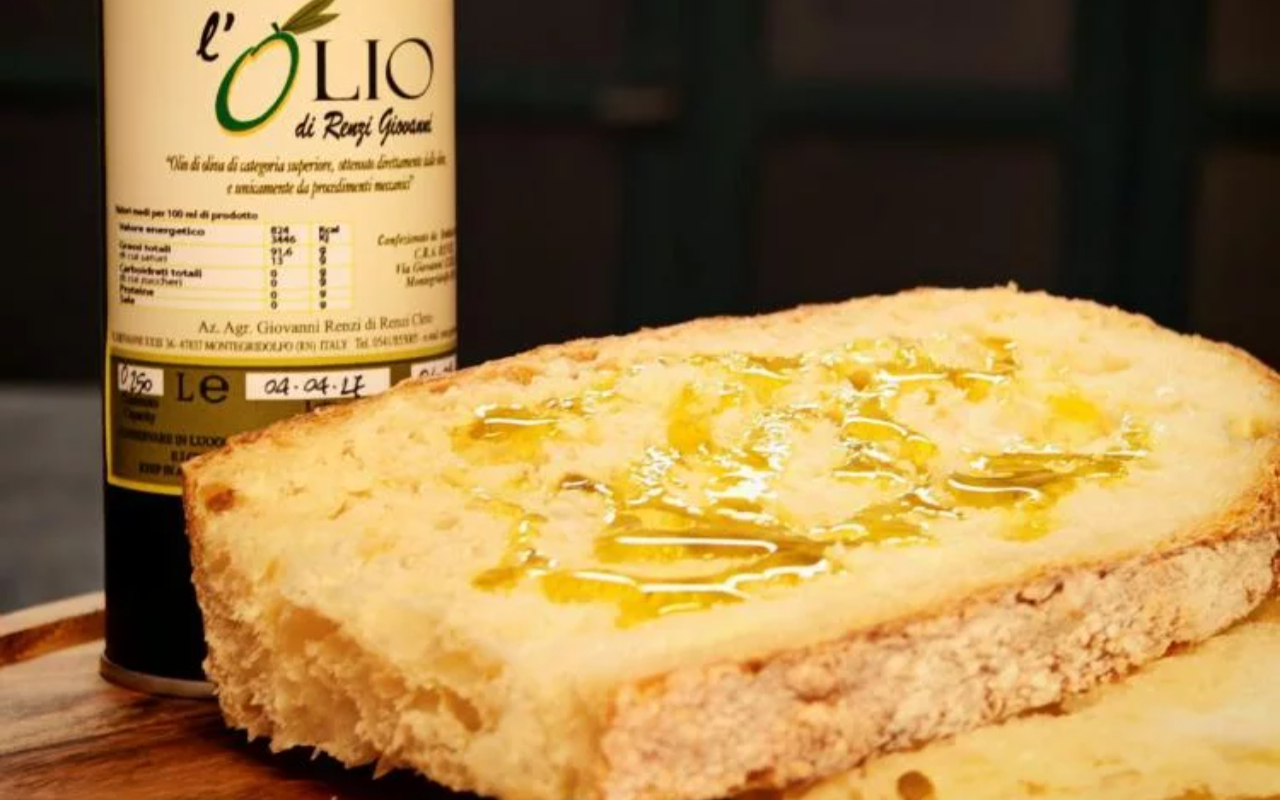 Discover the rich flavors of high-quality local olive oil served with traditional toasted bread