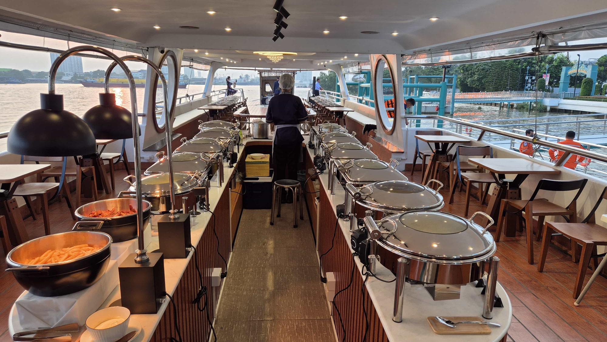 "Indulge in a lavish buffet aboard New Horizon Cruise."