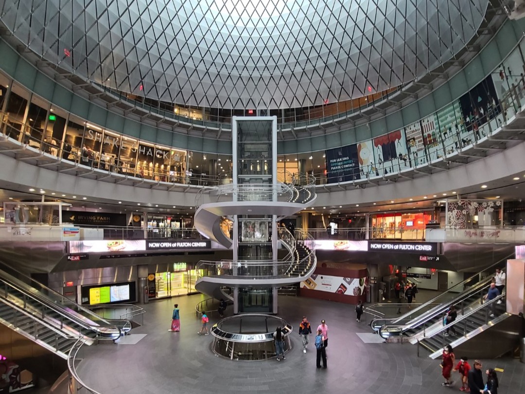Sleek, spacious station with polished floors, LED lighting, and contemporary architectural design