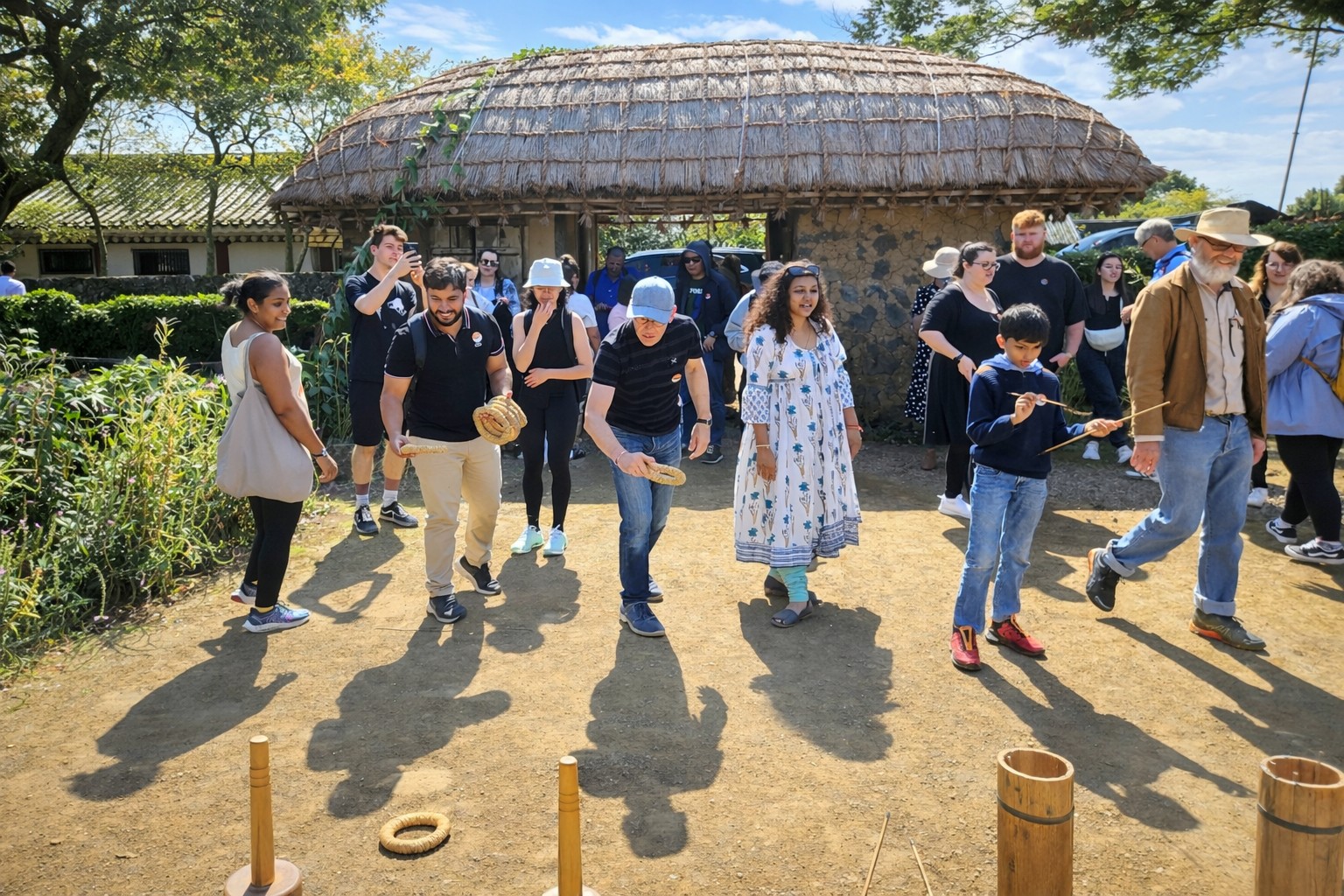 Enjoy the serene scenery of Seongeup Folk Village, where traditional thatched houses, stone walls, and lush nature come together.