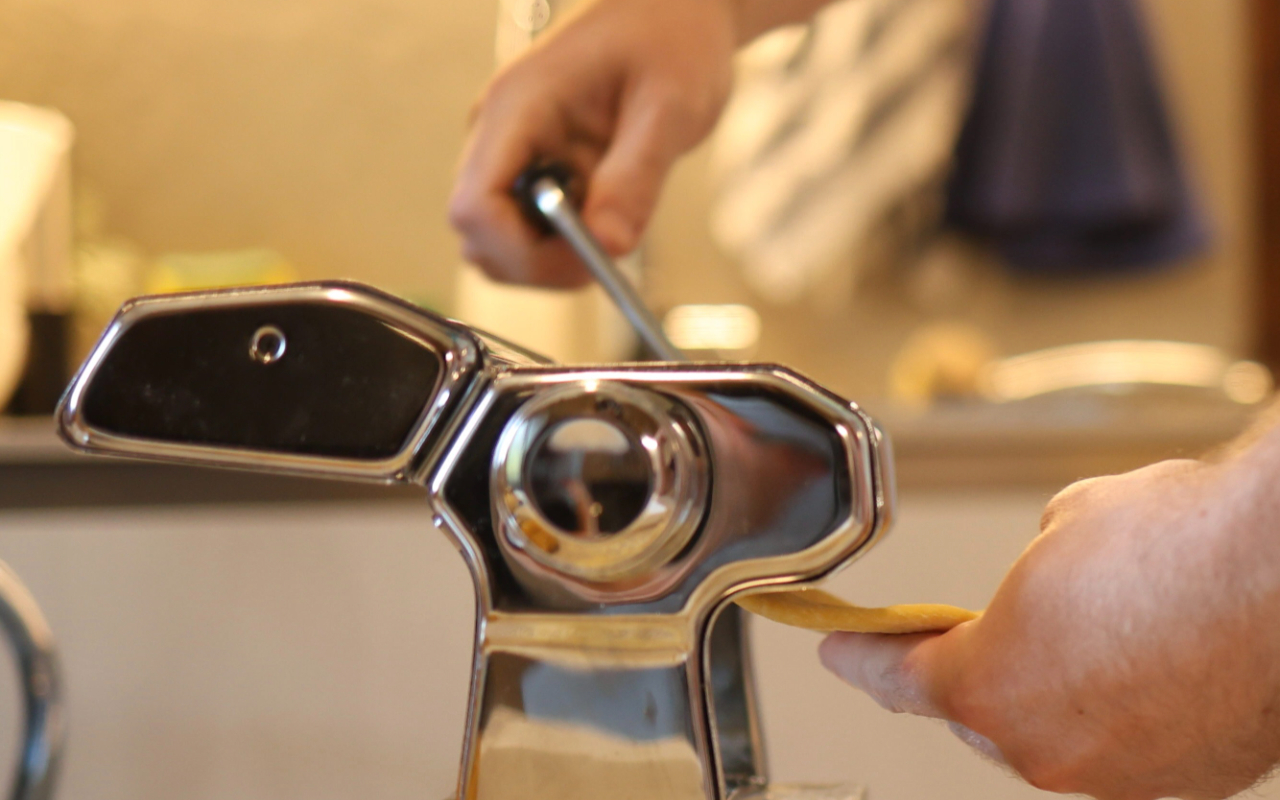 Learn to make fresh tagliatelle pasta from scratch in a warm family-style Tuscan kitchen